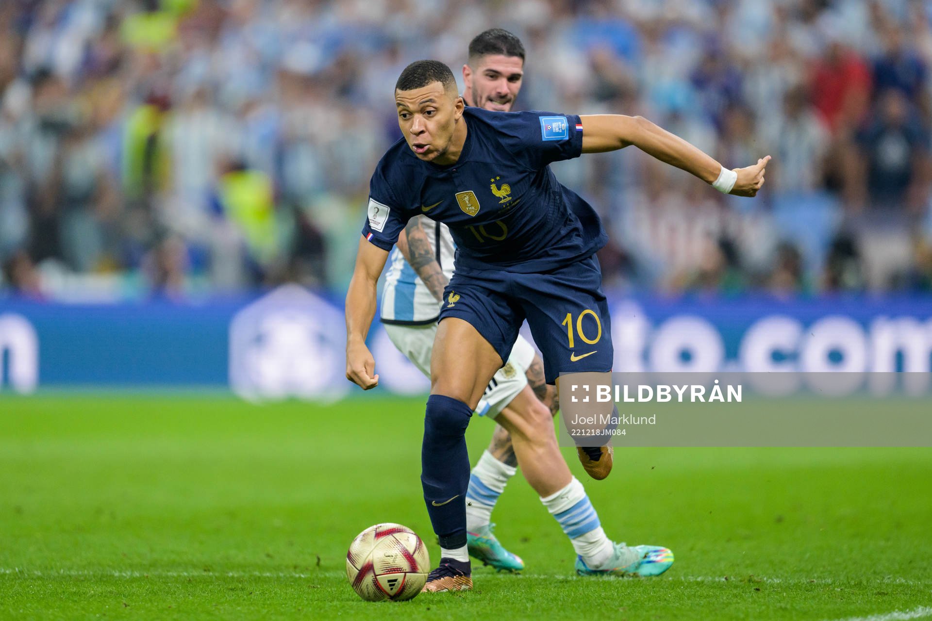 Kylian Mbappe of France and Rodrigo de Paul of Argentina