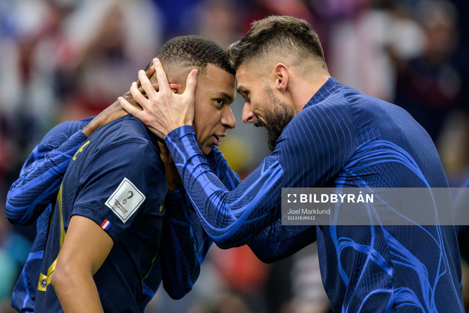 Kylian Mbappe and Olivier Giroud of France celebrate
