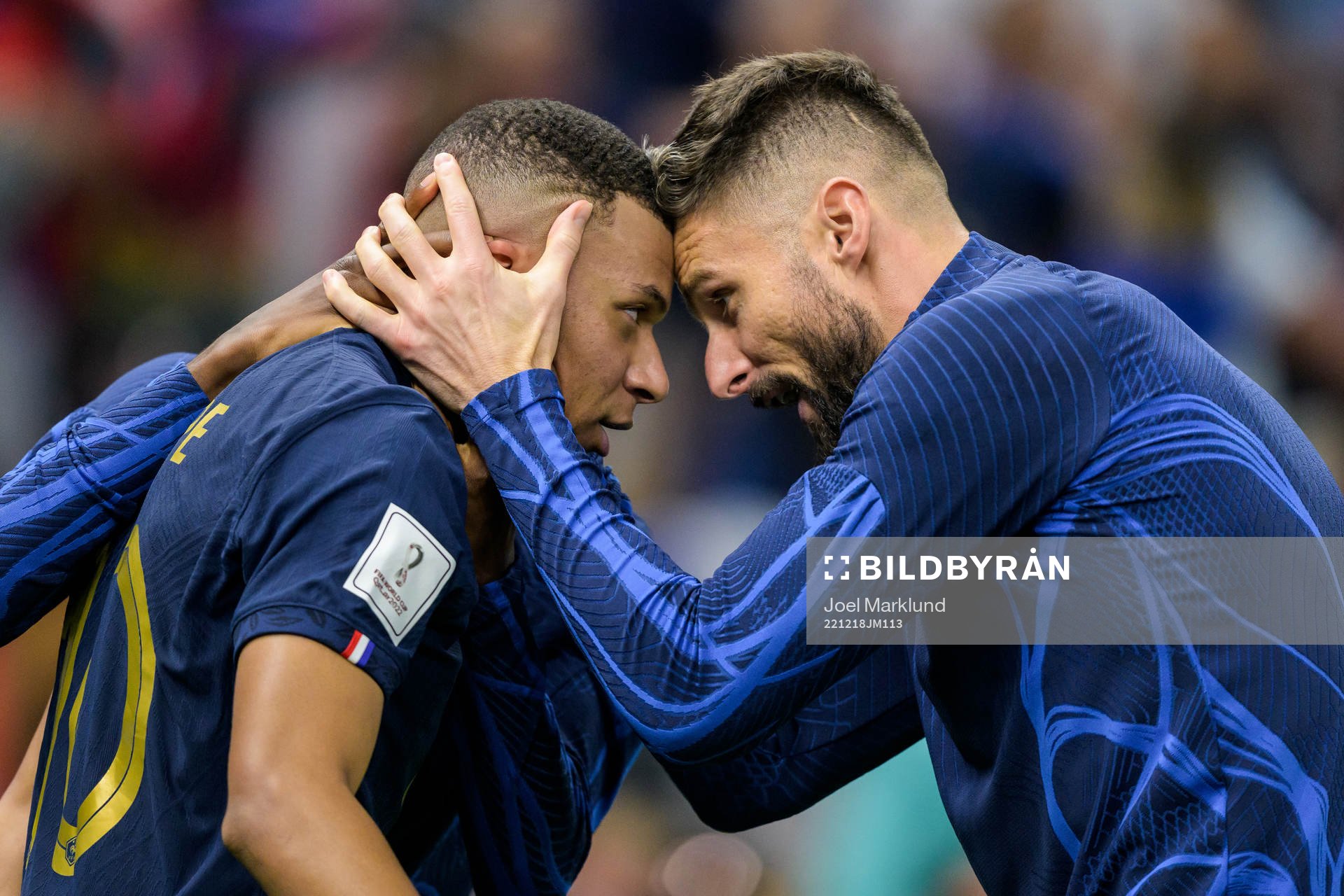 Kylian Mbappe and Olivier Giroud of France celebrate