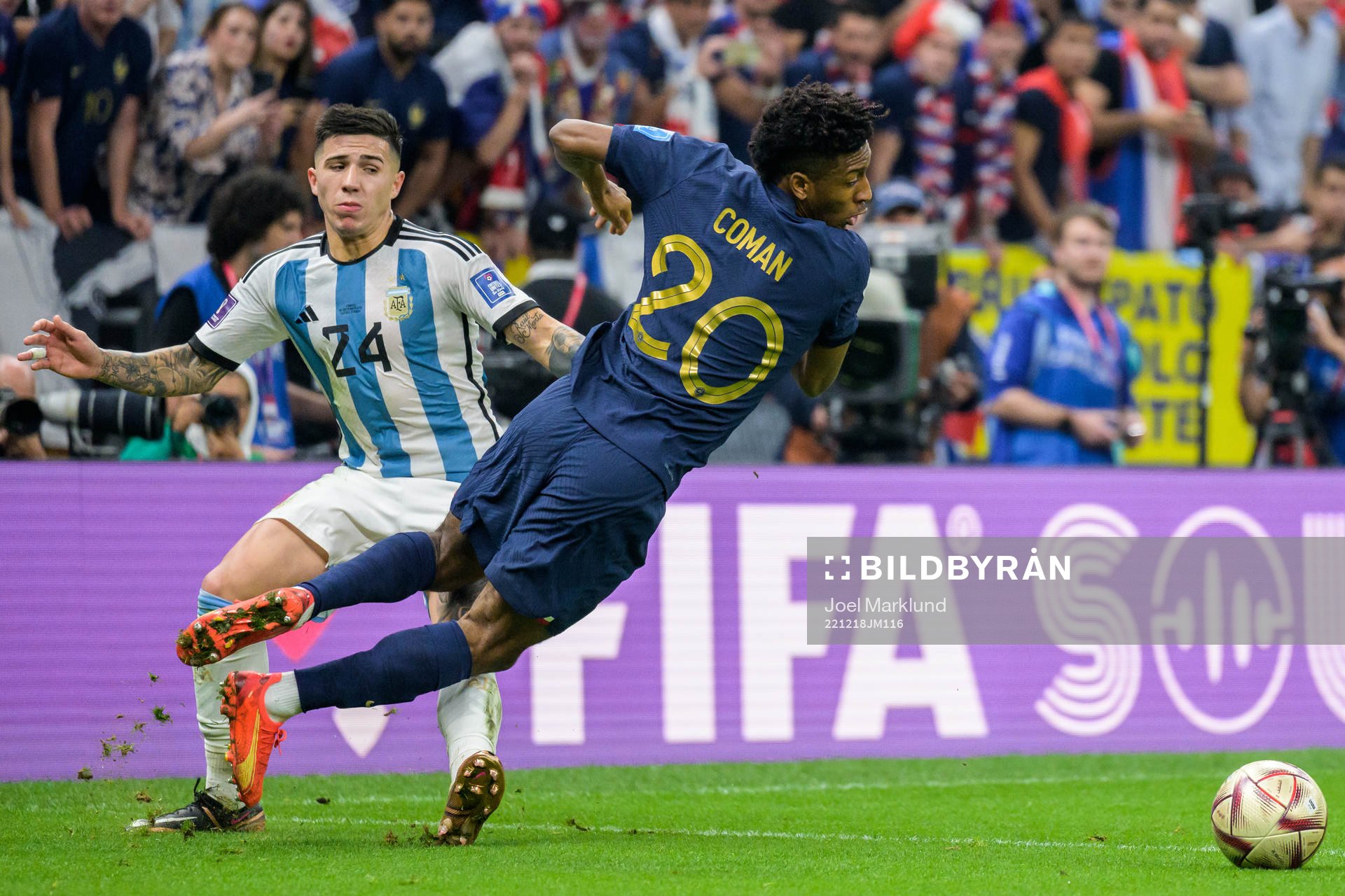 Enzo Fernandez of Argentina and Kingsley Coman of France during the FIFA World Cup 2022 final between Argentina and France on December 18, 2022 in Doha.