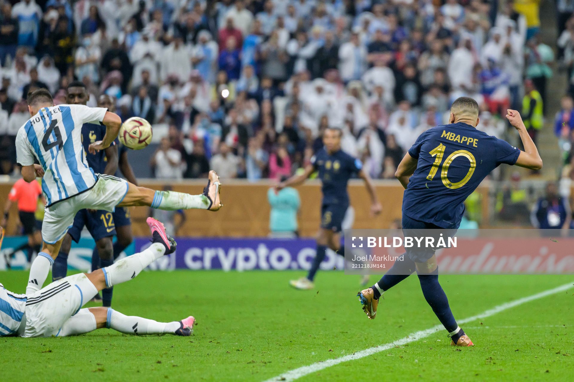 Kylian Mbappe of France shoots