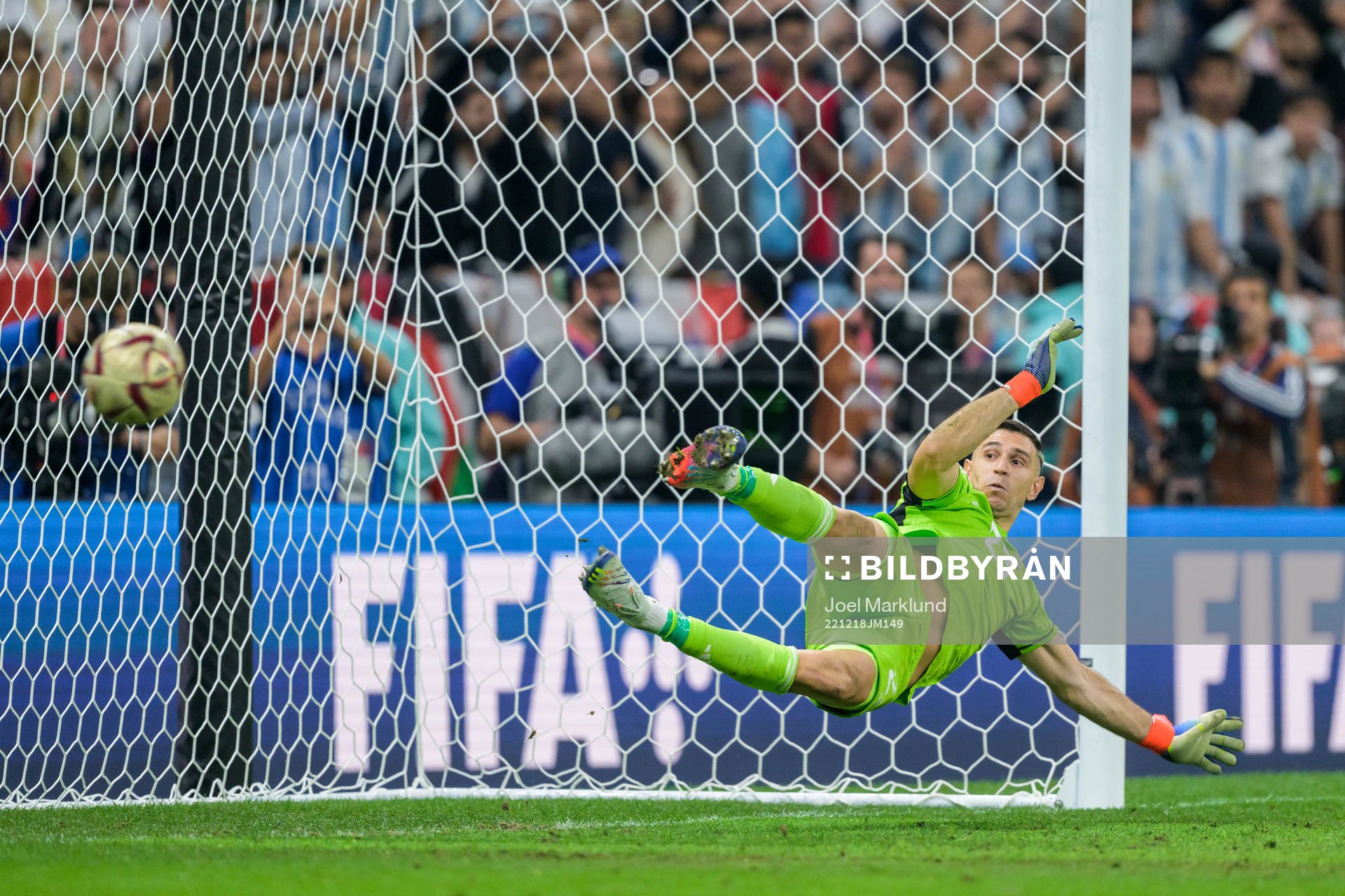 goalkeeper Emiliano Martinez of Argentina as Kylian Mbappe