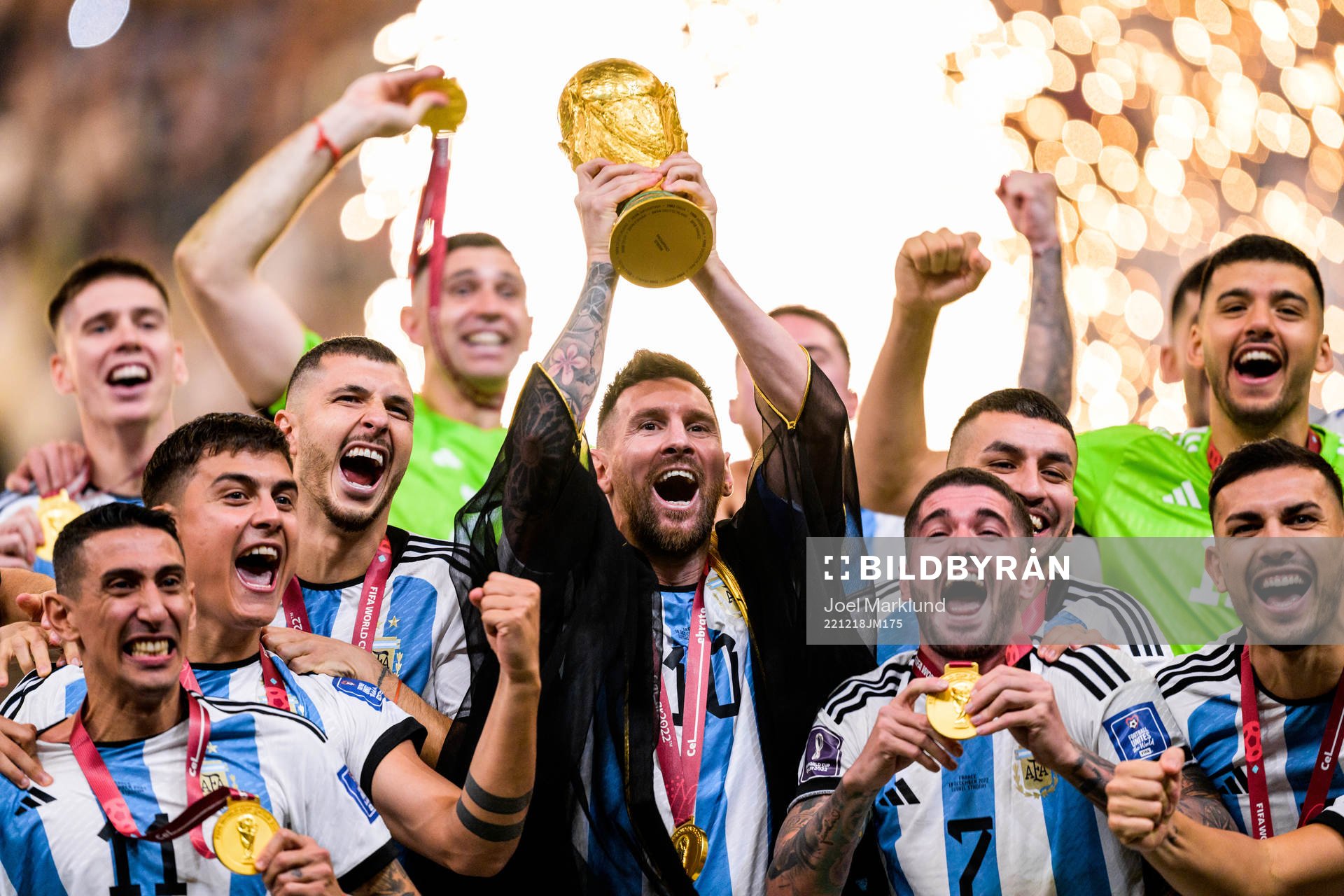 Lionel Messi of Argentina lifts the FIFA World Cup Trophy
