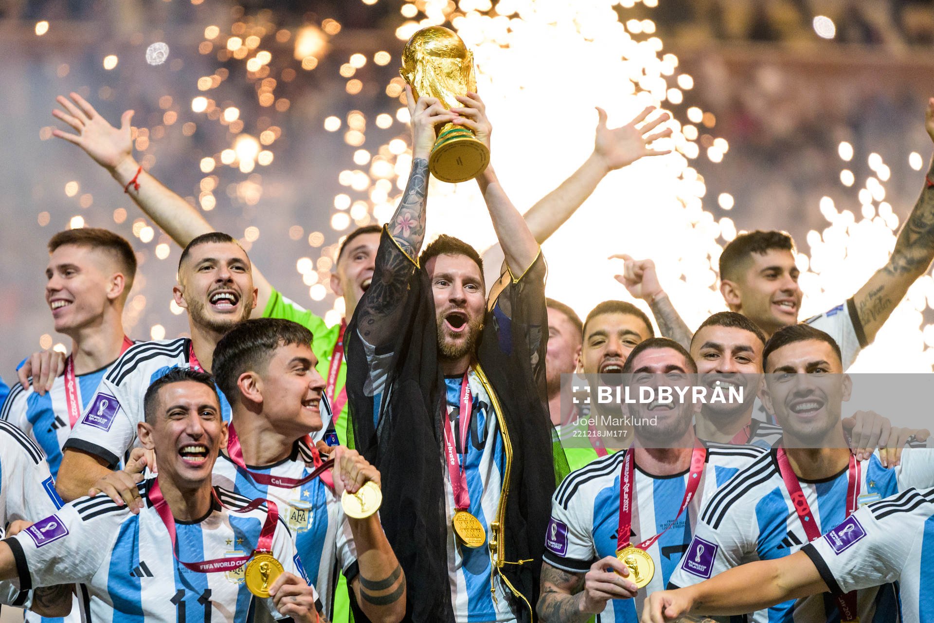 Lionel Messi of Argentina lifts the FIFA World Cup Trophy