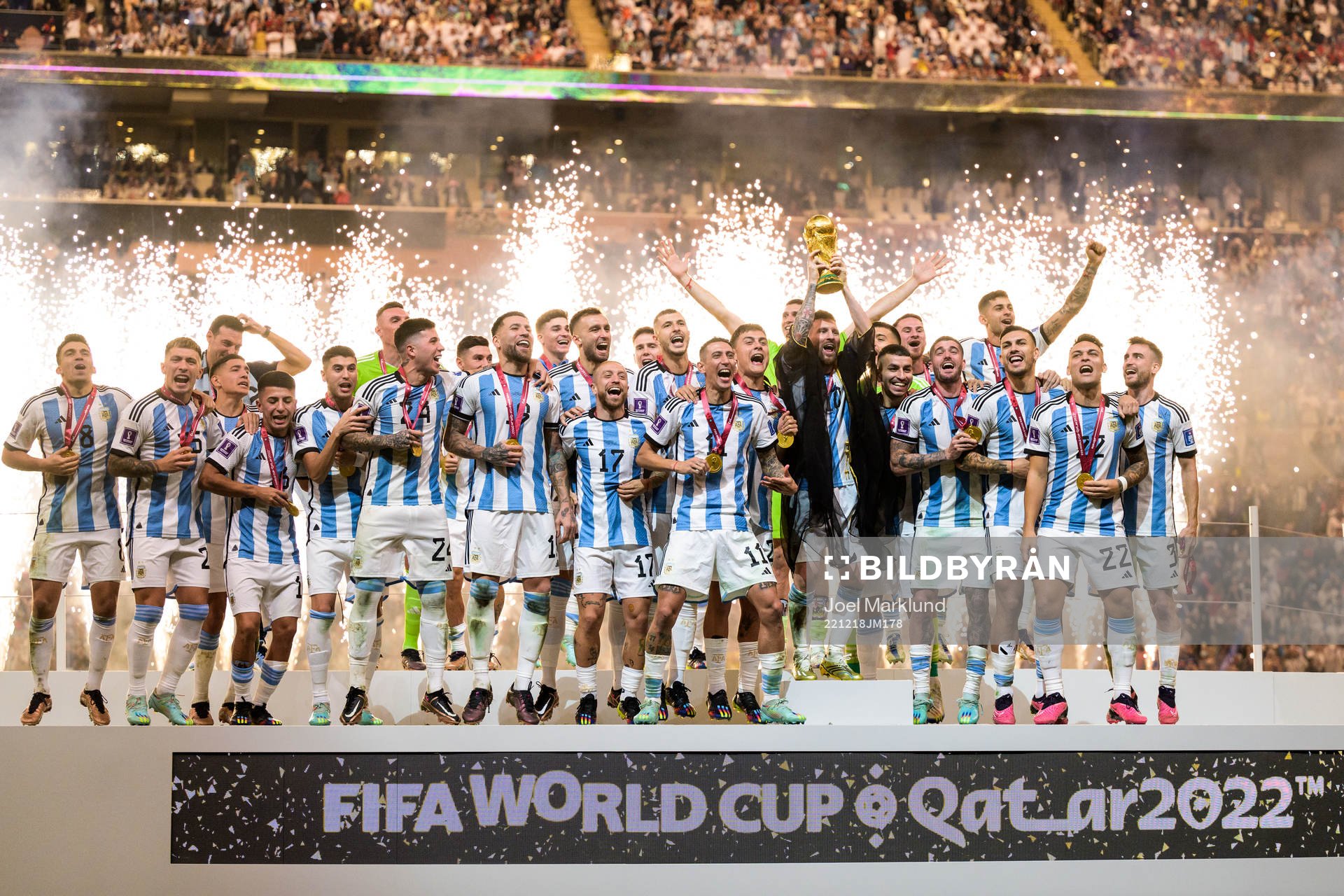 Lionel Messi of Argentina lifts the FIFA World Cup Trophy
