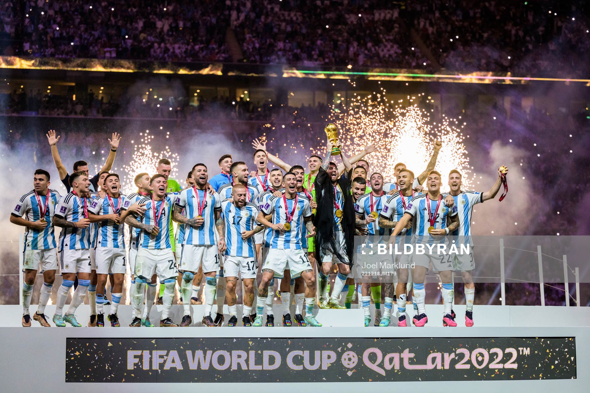 Lionel Messi of Argentina lifts the FIFA World Cup Trophy