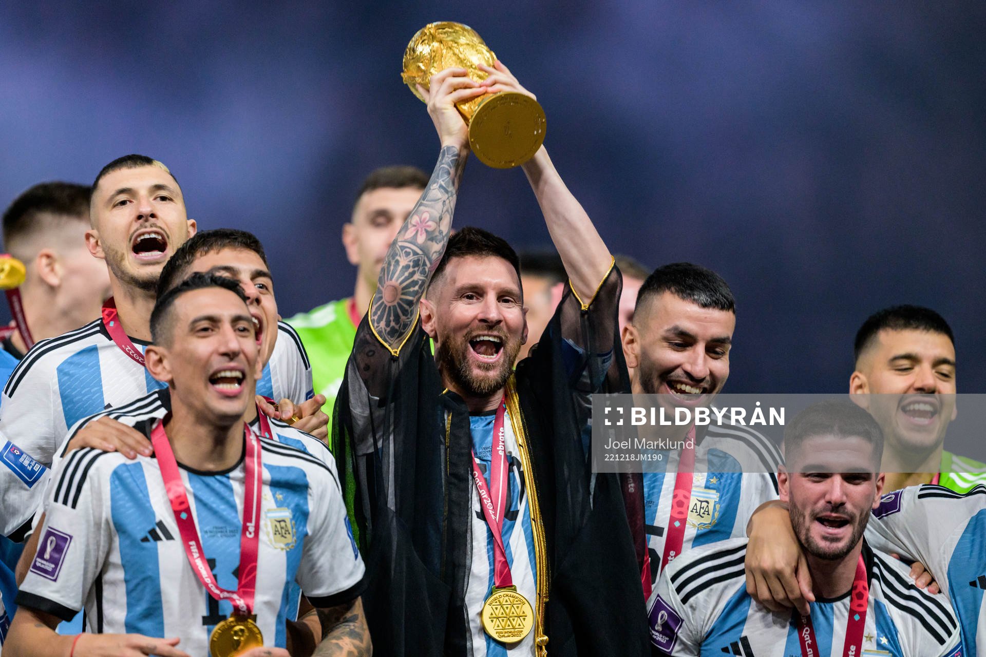 Lionel Messi of Argentina lifts the FIFA World Cup Trophy