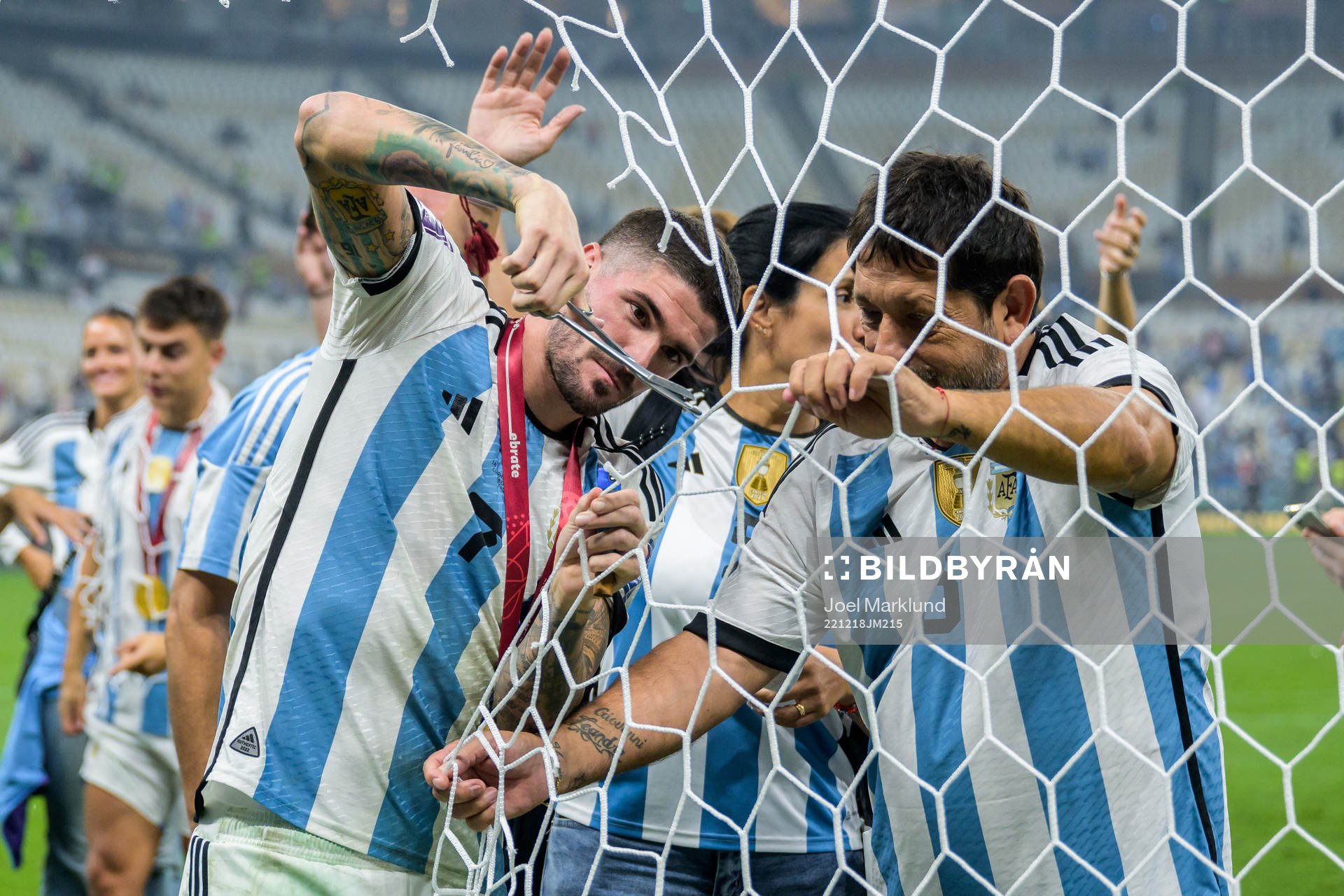 Rodrigo de Paul of Argentina cut the net of the goal