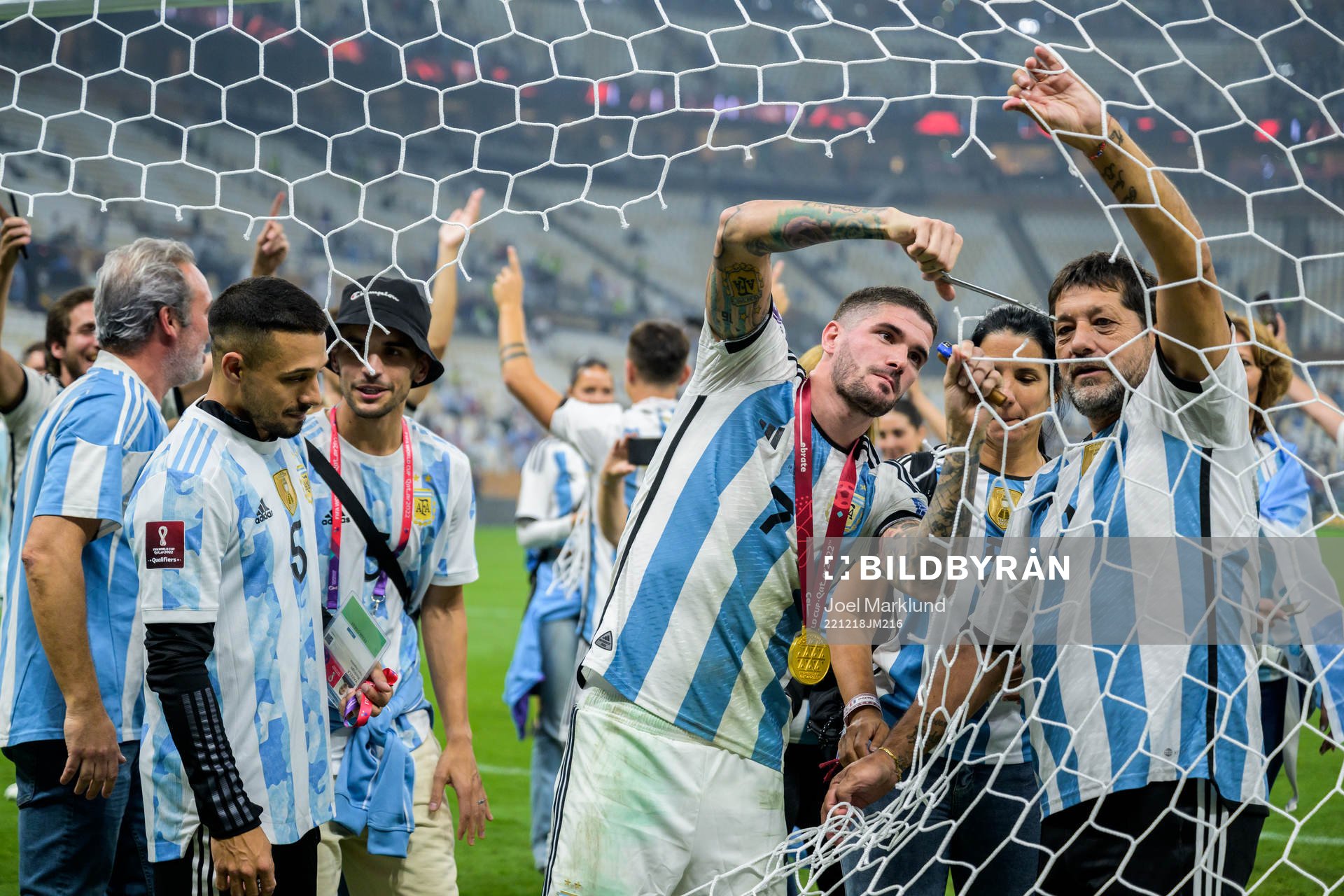 Rodrigo de Paul of Argentina cut the net of the goal