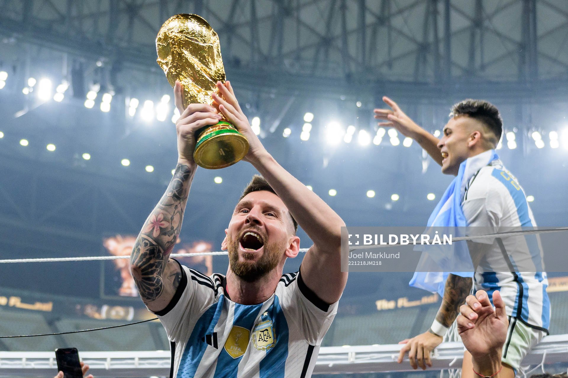 Lionel Messi of Argentina celebrates with the FIFA World