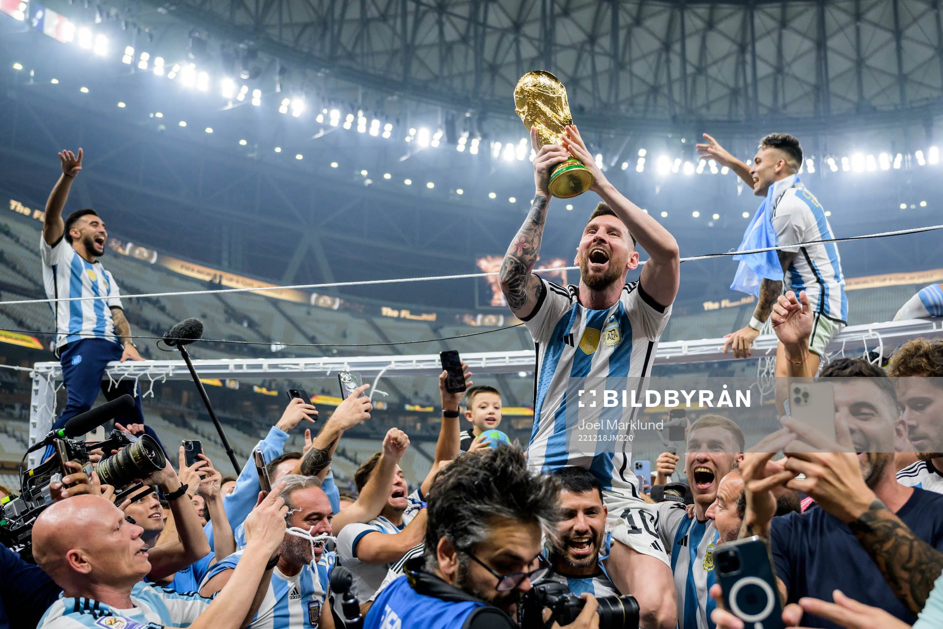 Lionel Messi of Argentina celebrates with the FIFA World