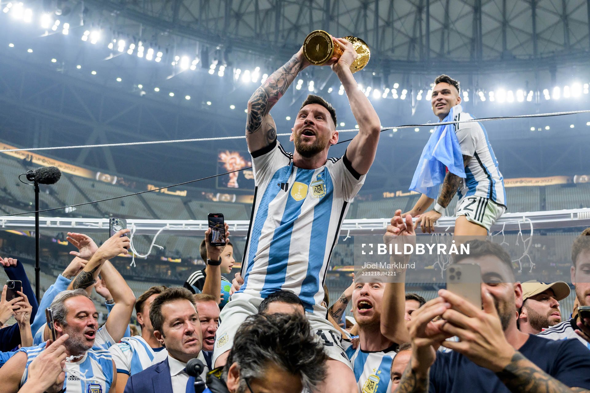 Lionel Messi of Argentina celebrates with the FIFA World