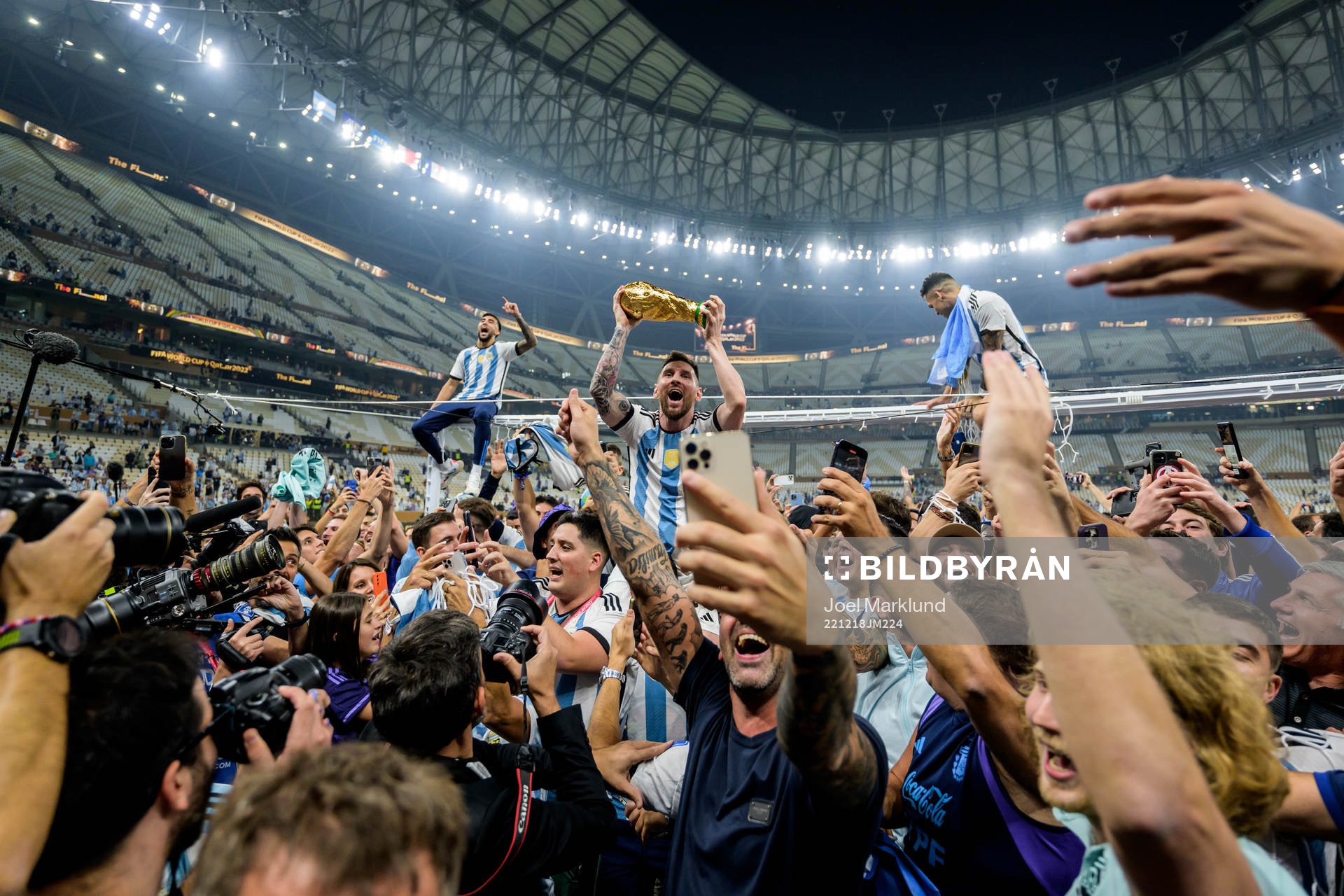 Lionel Messi of Argentina celebrates with the FIFA World