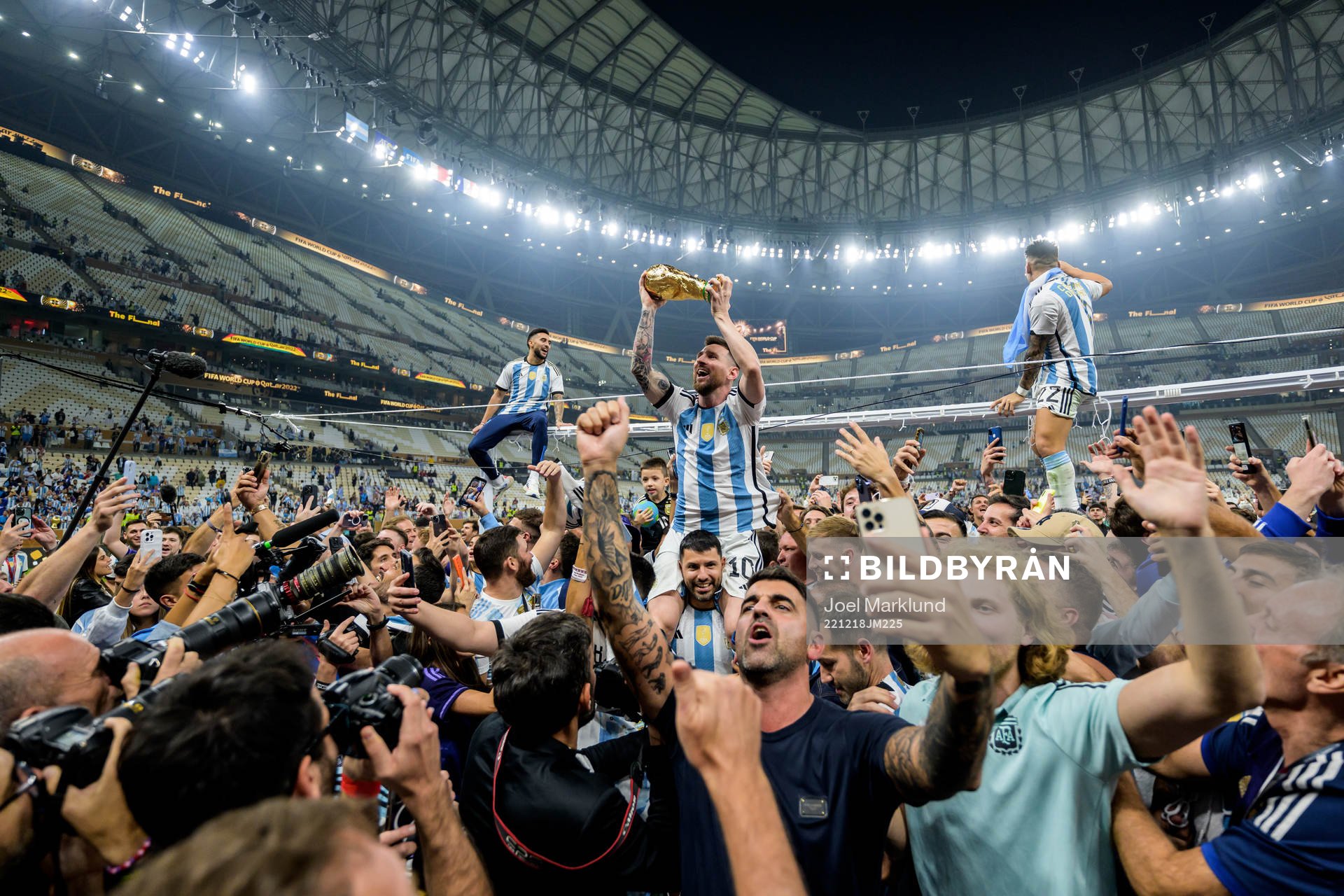 Lionel Messi of Argentina celebrates with the FIFA World