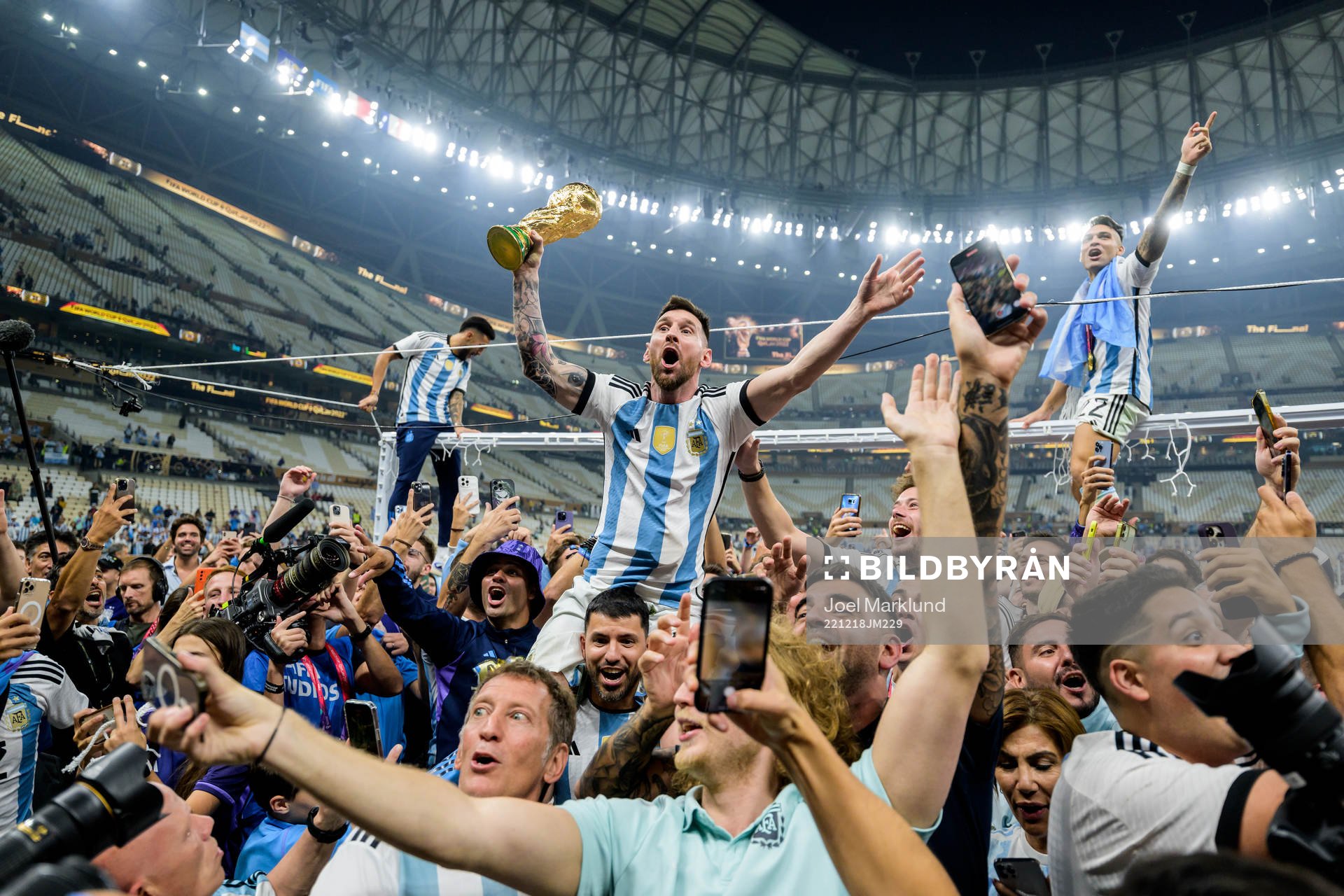 Lionel Messi of Argentina celebrates with the FIFA World