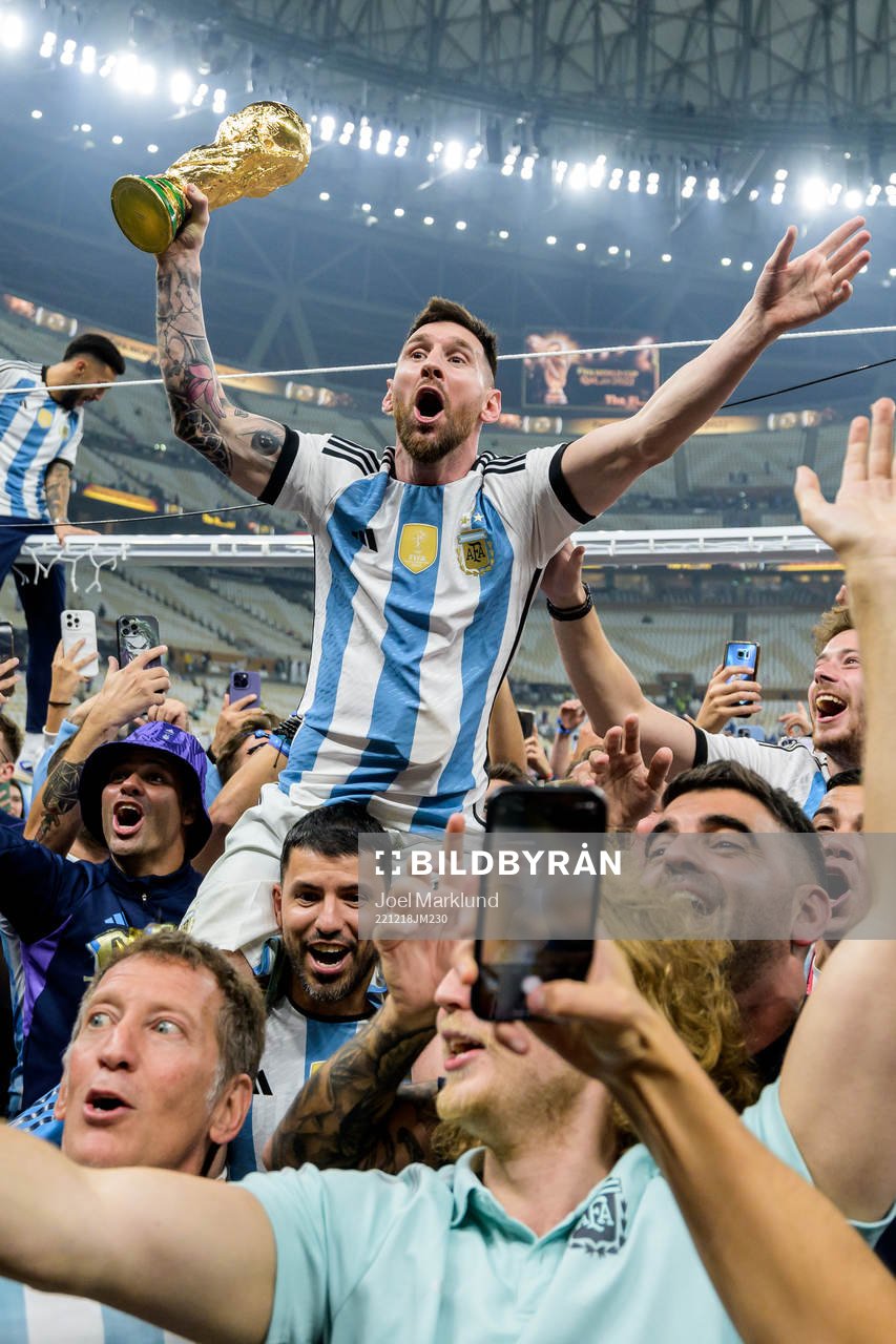 Lionel Messi of Argentina celebrates with the FIFA World