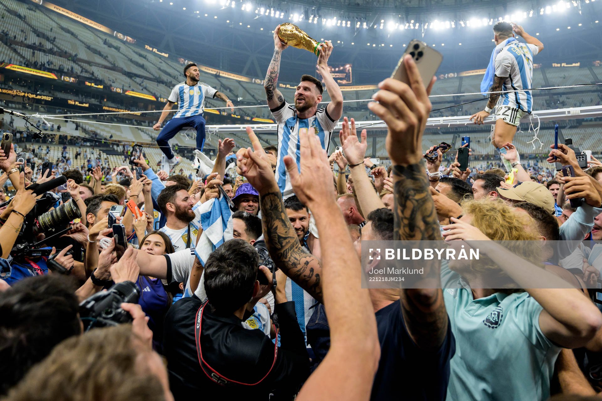 Lionel Messi of Argentina celebrates with the FIFA World