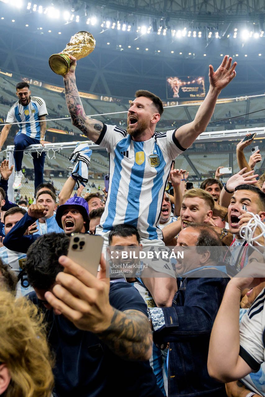 Lionel Messi of Argentina celebrates with the FIFA World
