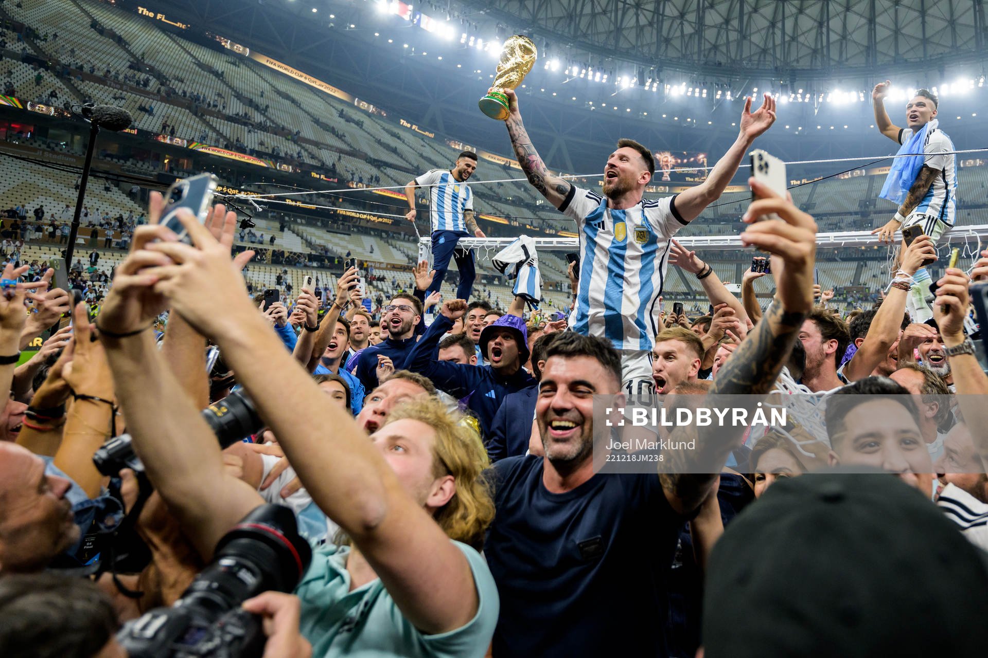 Lionel Messi of Argentina celebrates with the FIFA World