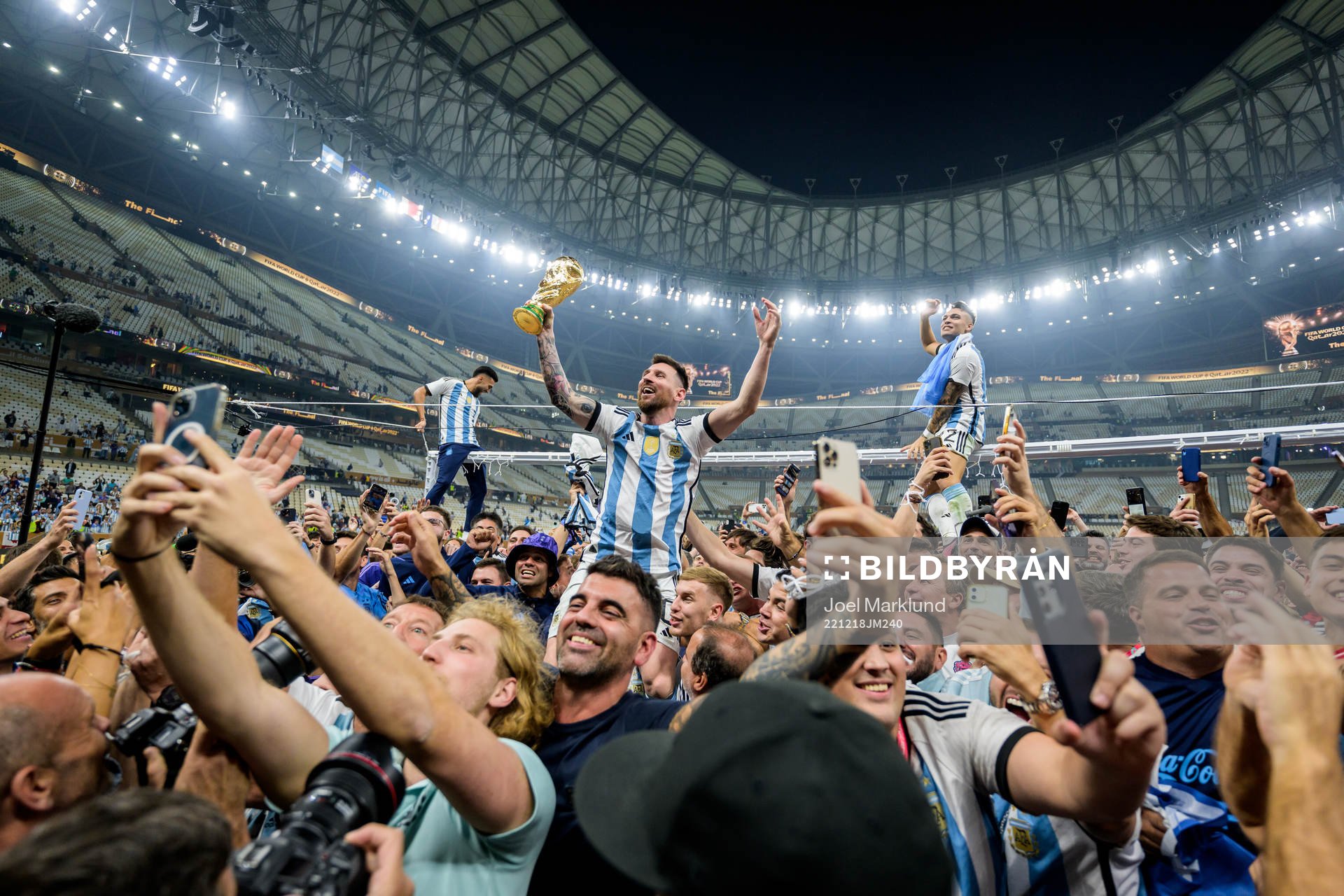 Lionel Messi of Argentina celebrates with the FIFA World