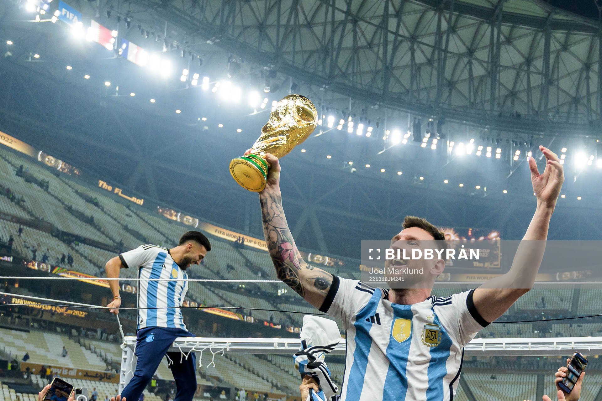Lionel Messi of Argentina celebrates with the FIFA World