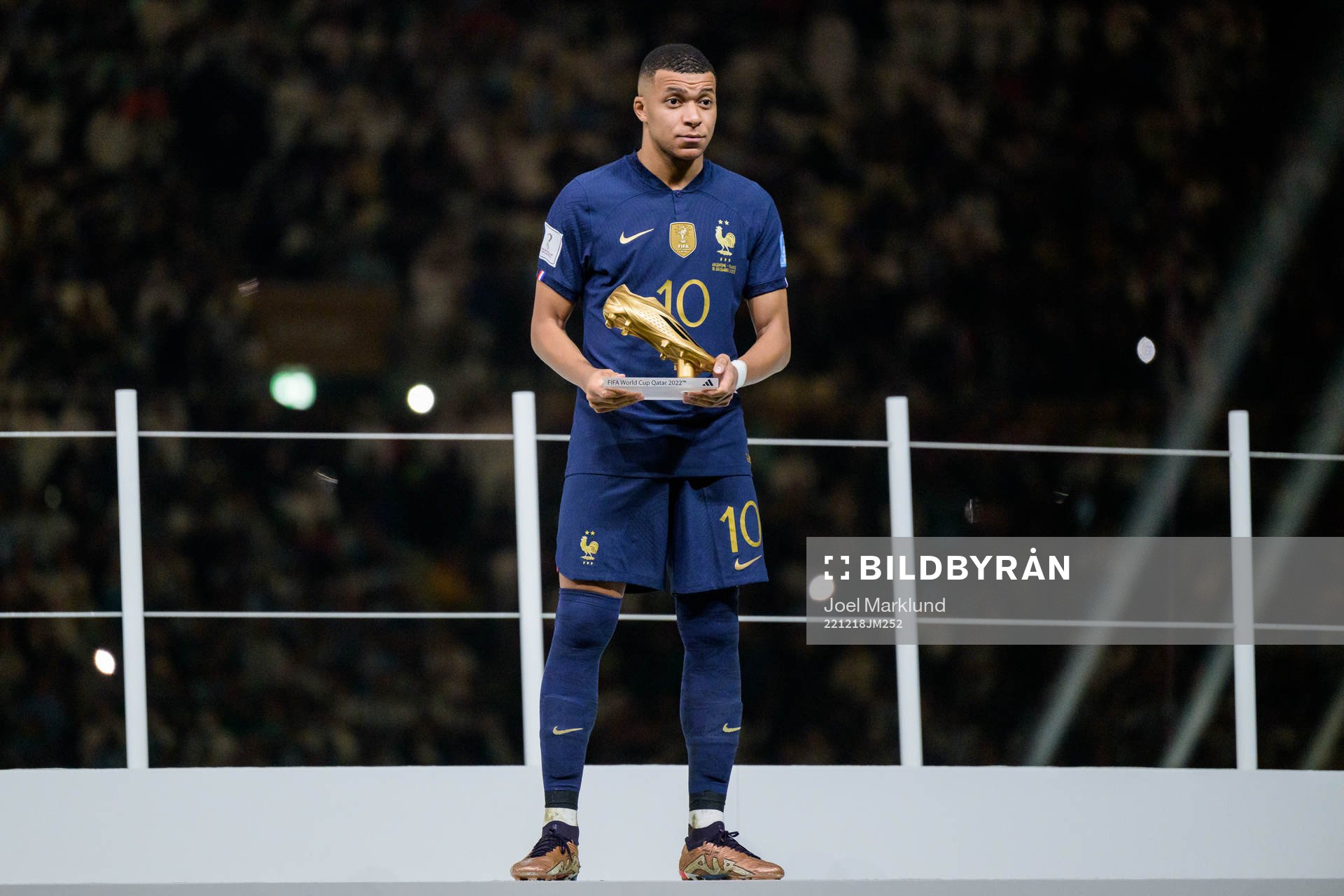 Kylian Mbappe of France with his award