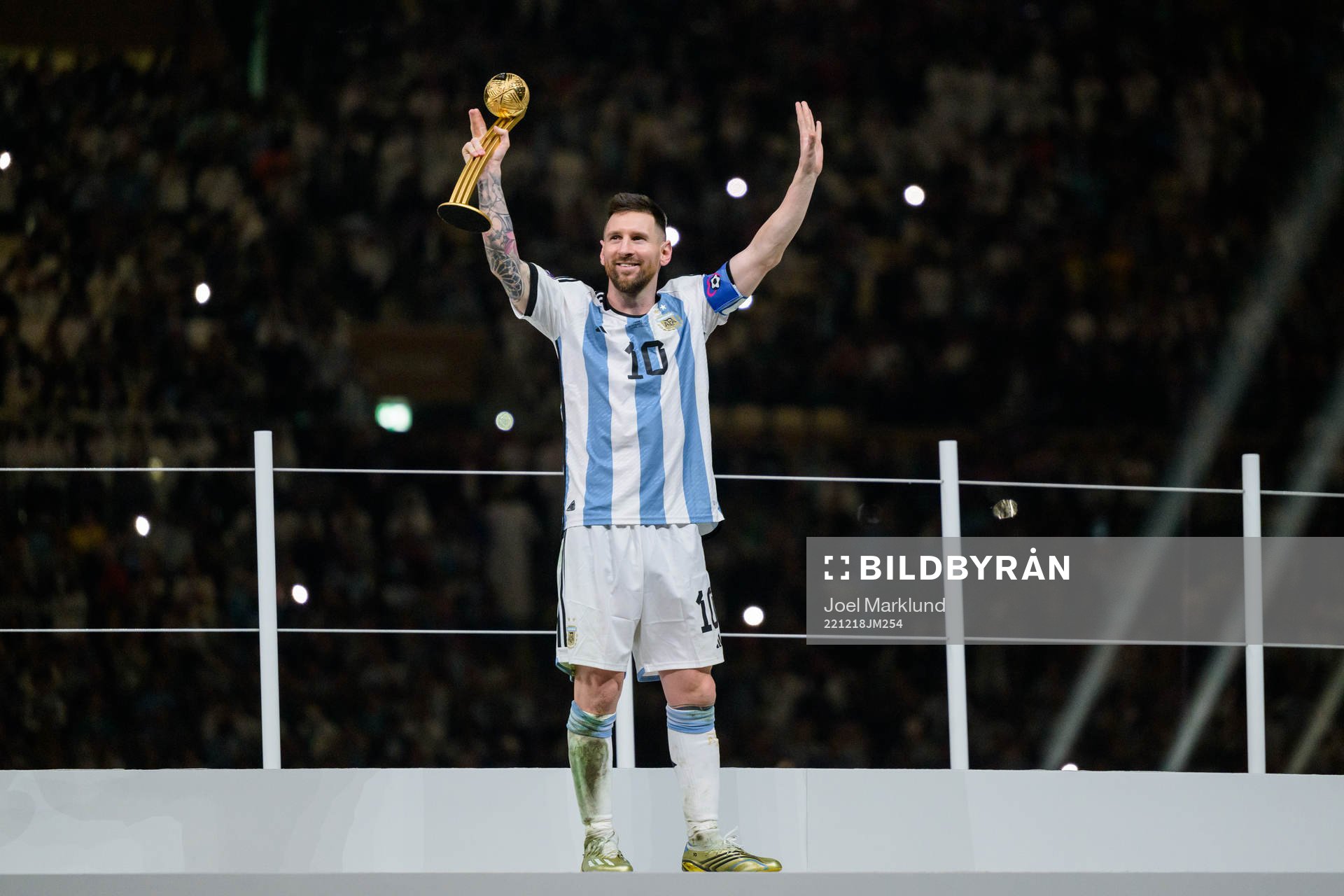 Lionel Messi of Argentina with his award