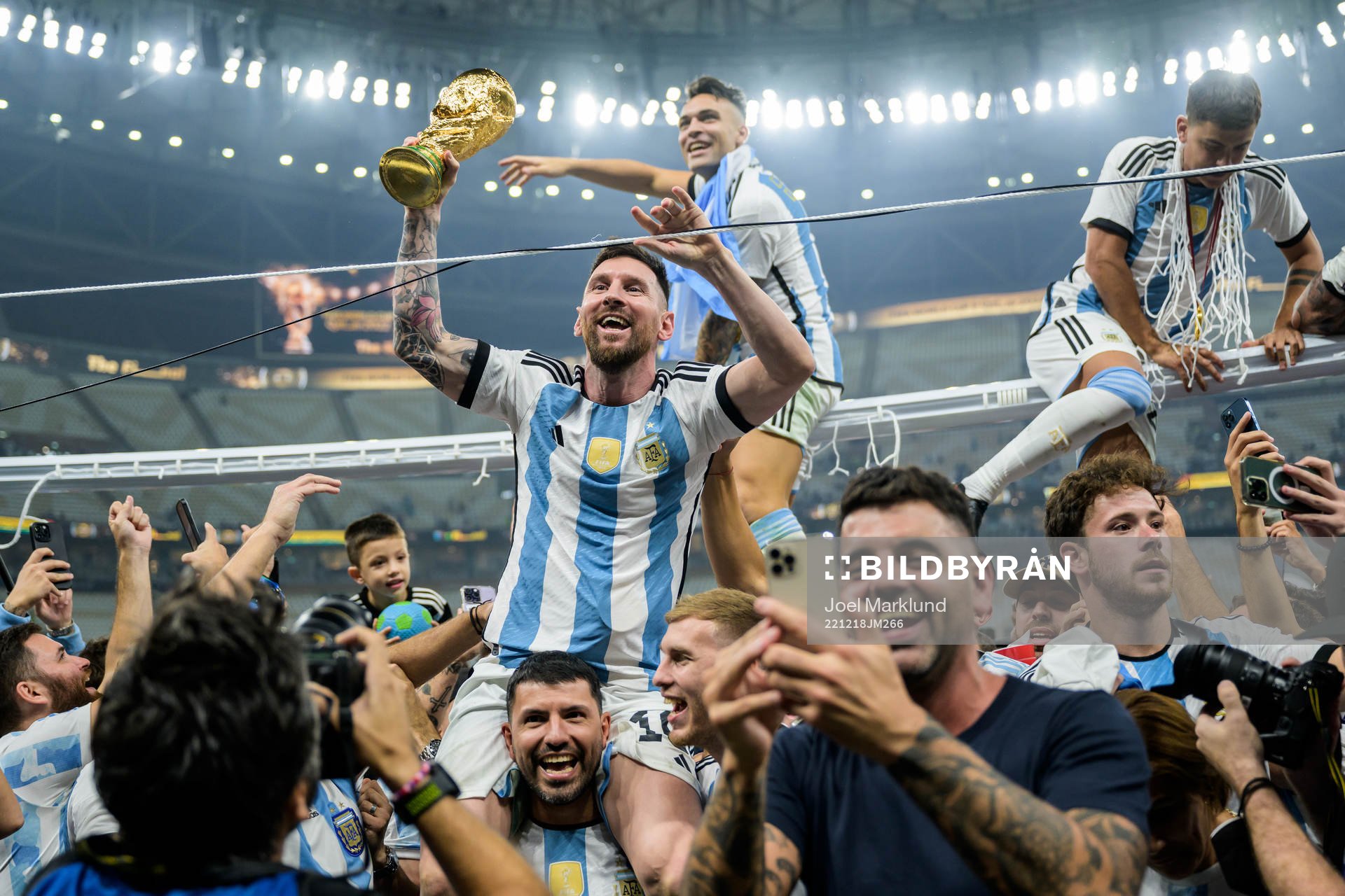 Lionel Messi of Argentina celebrates with the FIFA world