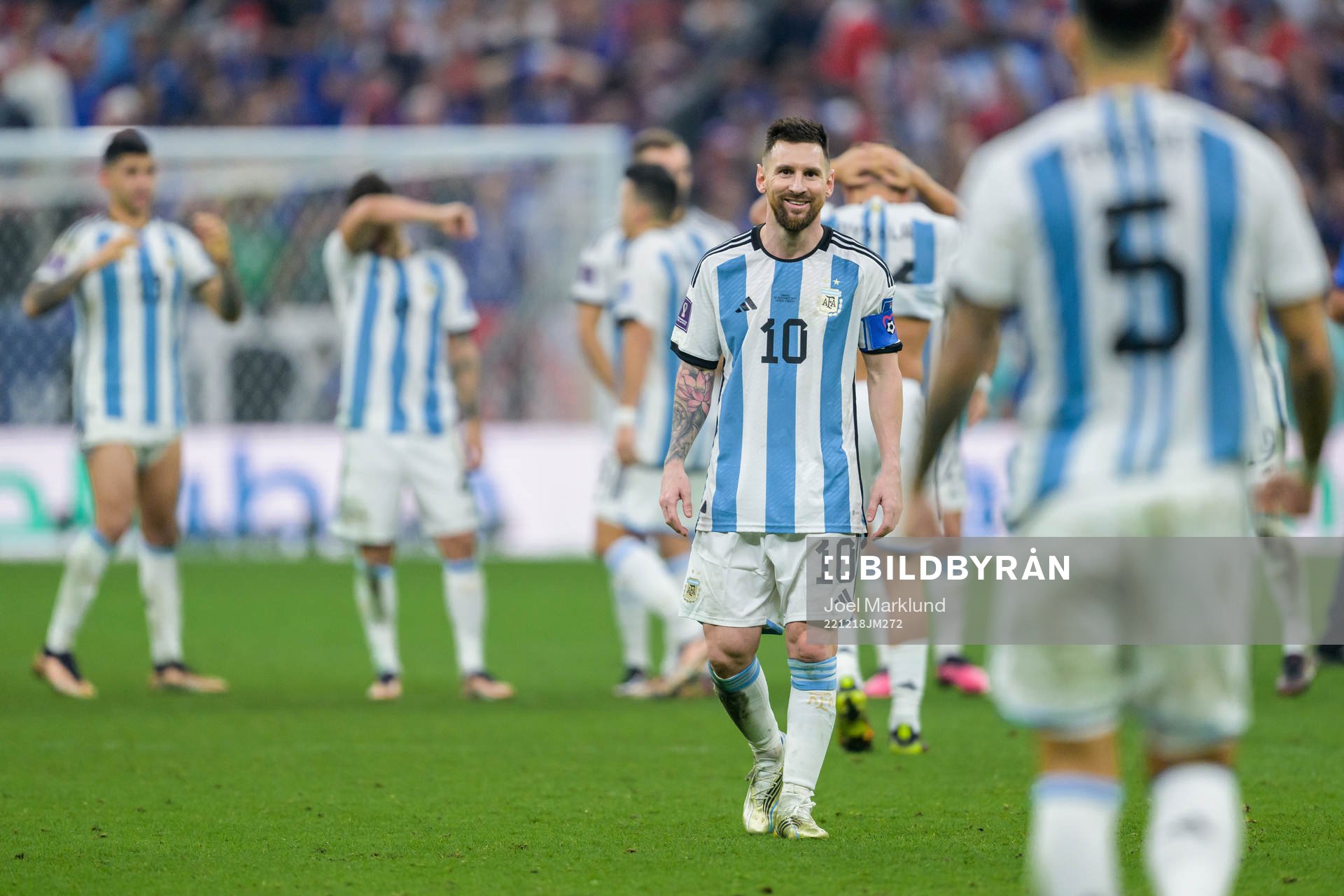 Lionel Messi of Argentina and Leandro Paredes