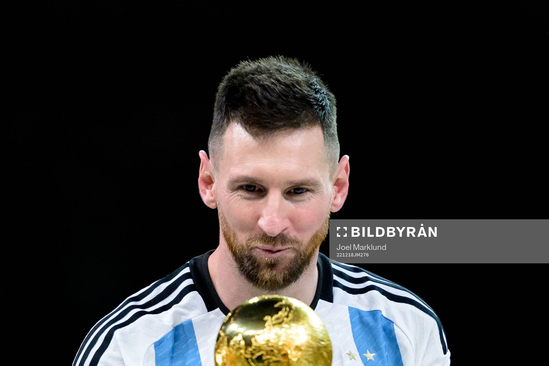 Lionel Messi of Argentina with the FIFA World Cup Trophy