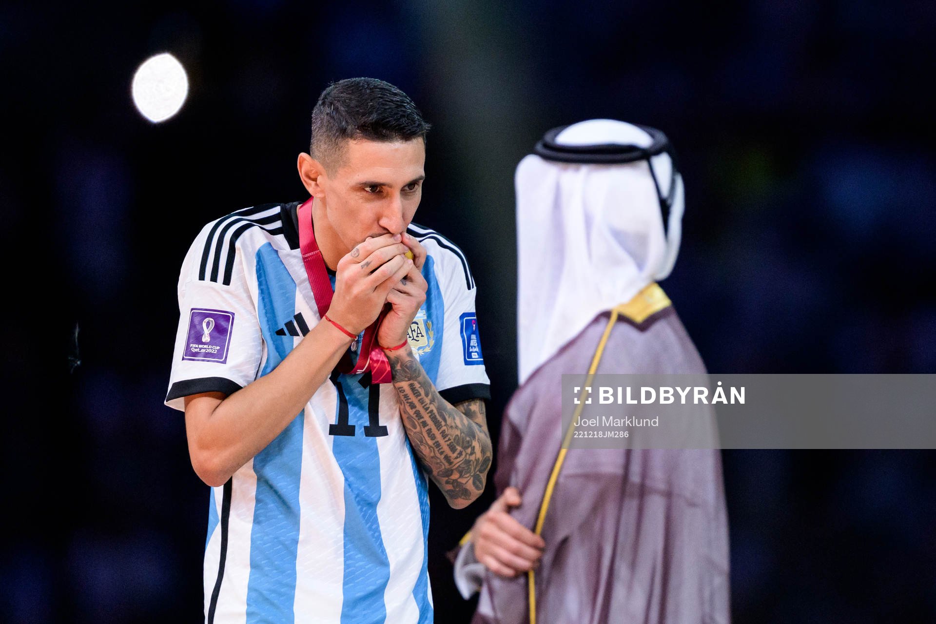 Angel de Maria of Argentina kisses his gold medal