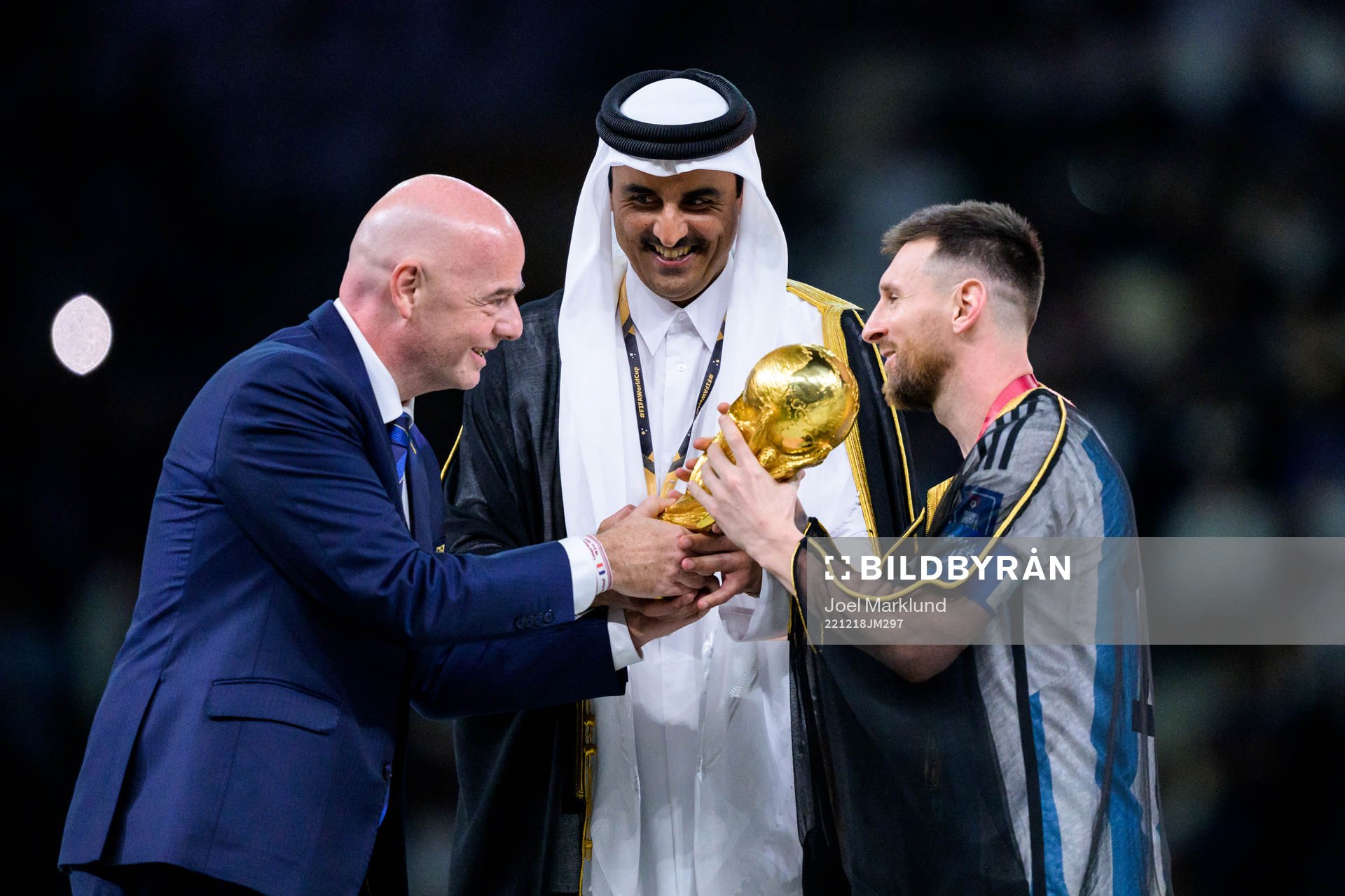 Gianni Infantino, president of FIFA, hands over the FIFA