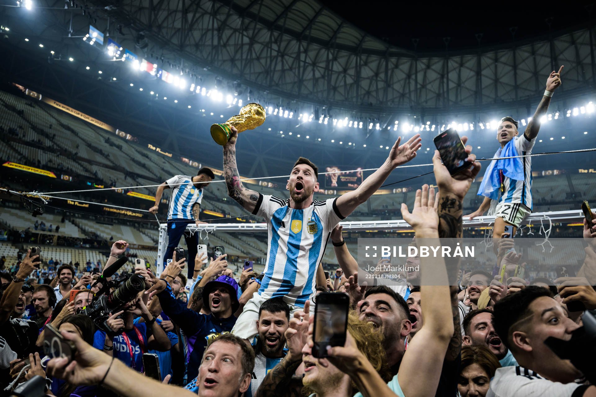 Lionel Messi of Argentina celebrates with the World Cup
