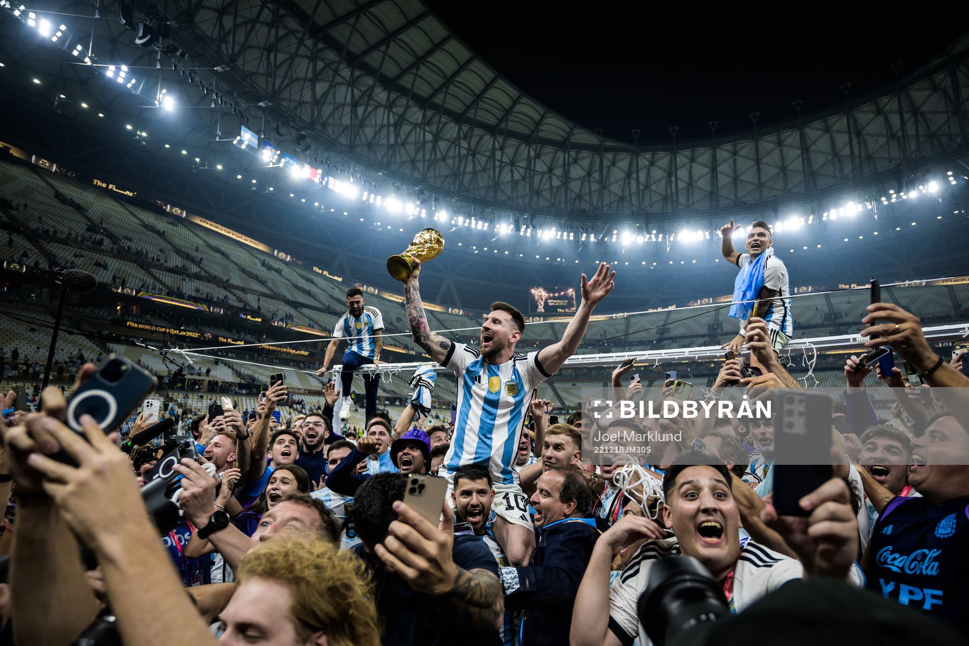 Lionel Messi of Argentina celebrates with the World Cup