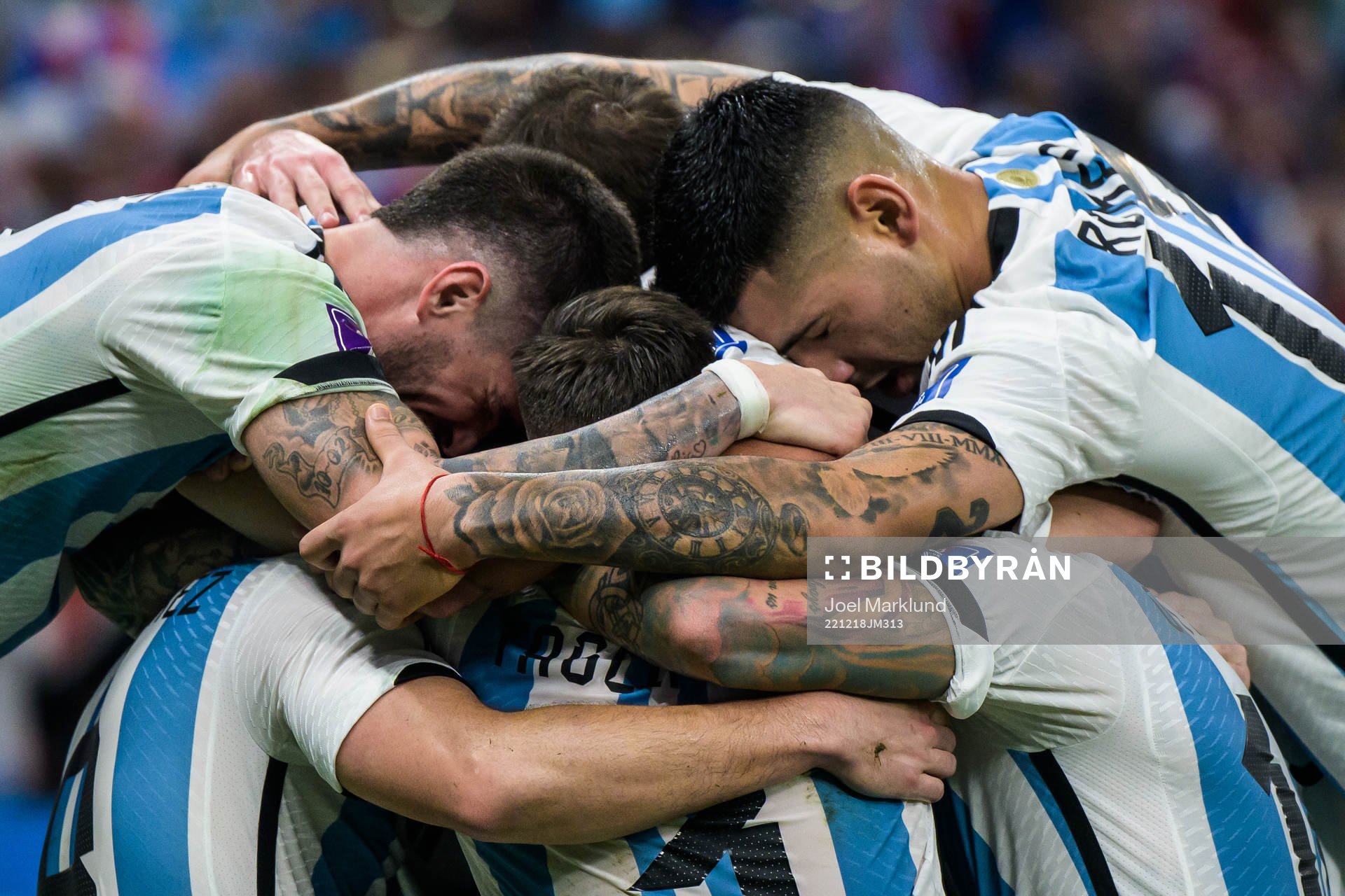 Players of Argentina celebrate the 2-0 goal by Angel de
