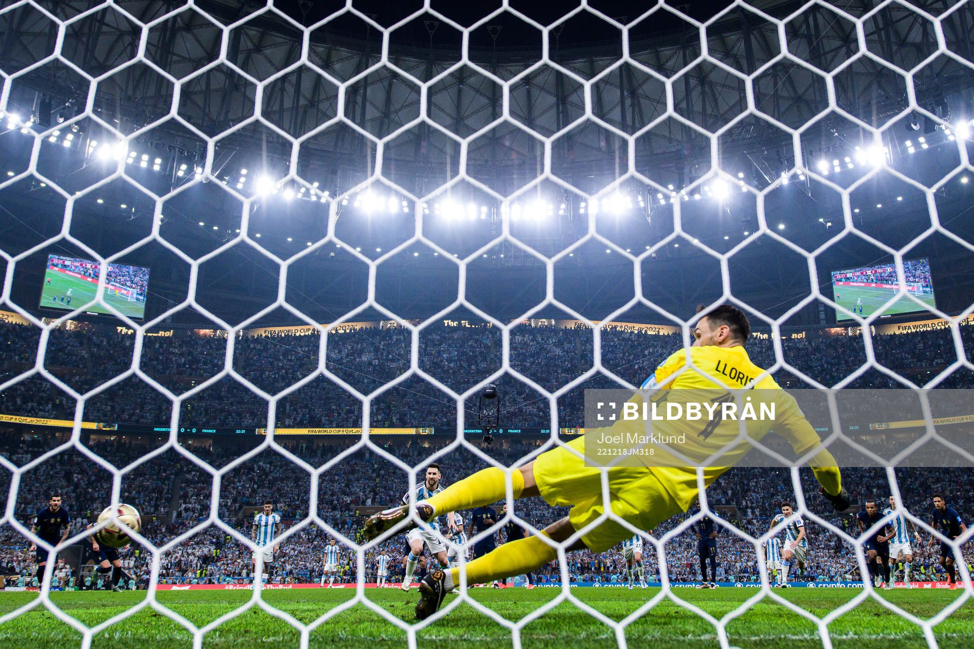 Lionel Messi of Argentina scores 1-0 behind goalkeeper Hugo