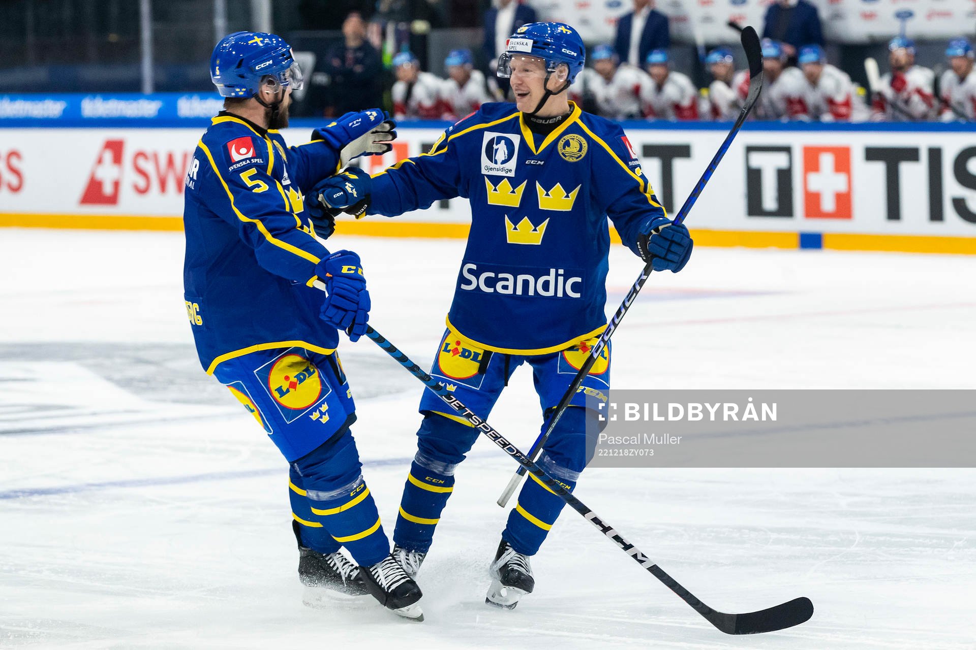Oscar Fantenberg and Emil Heineman of Sweden celebrate