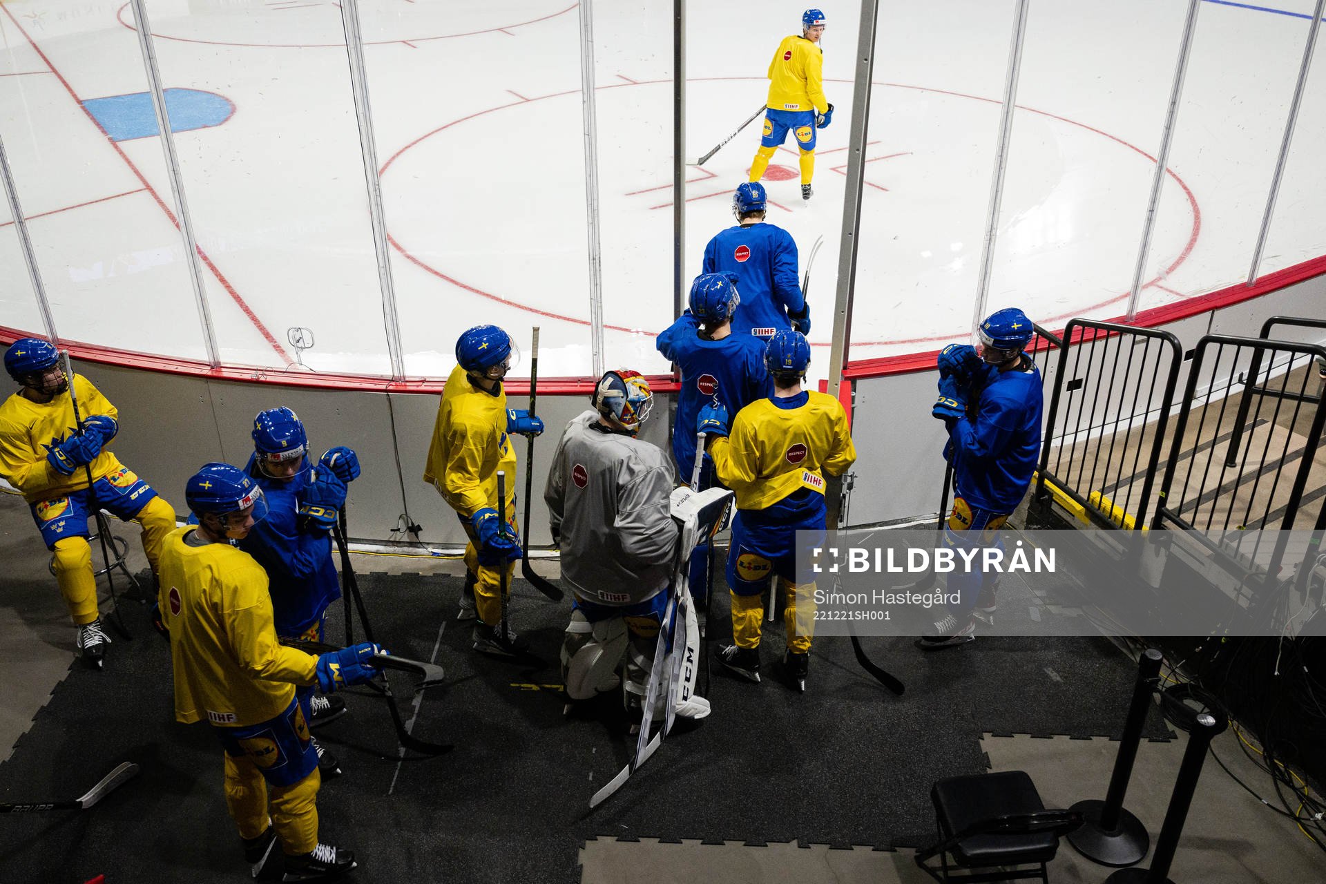 Players of Sweden enters the ice