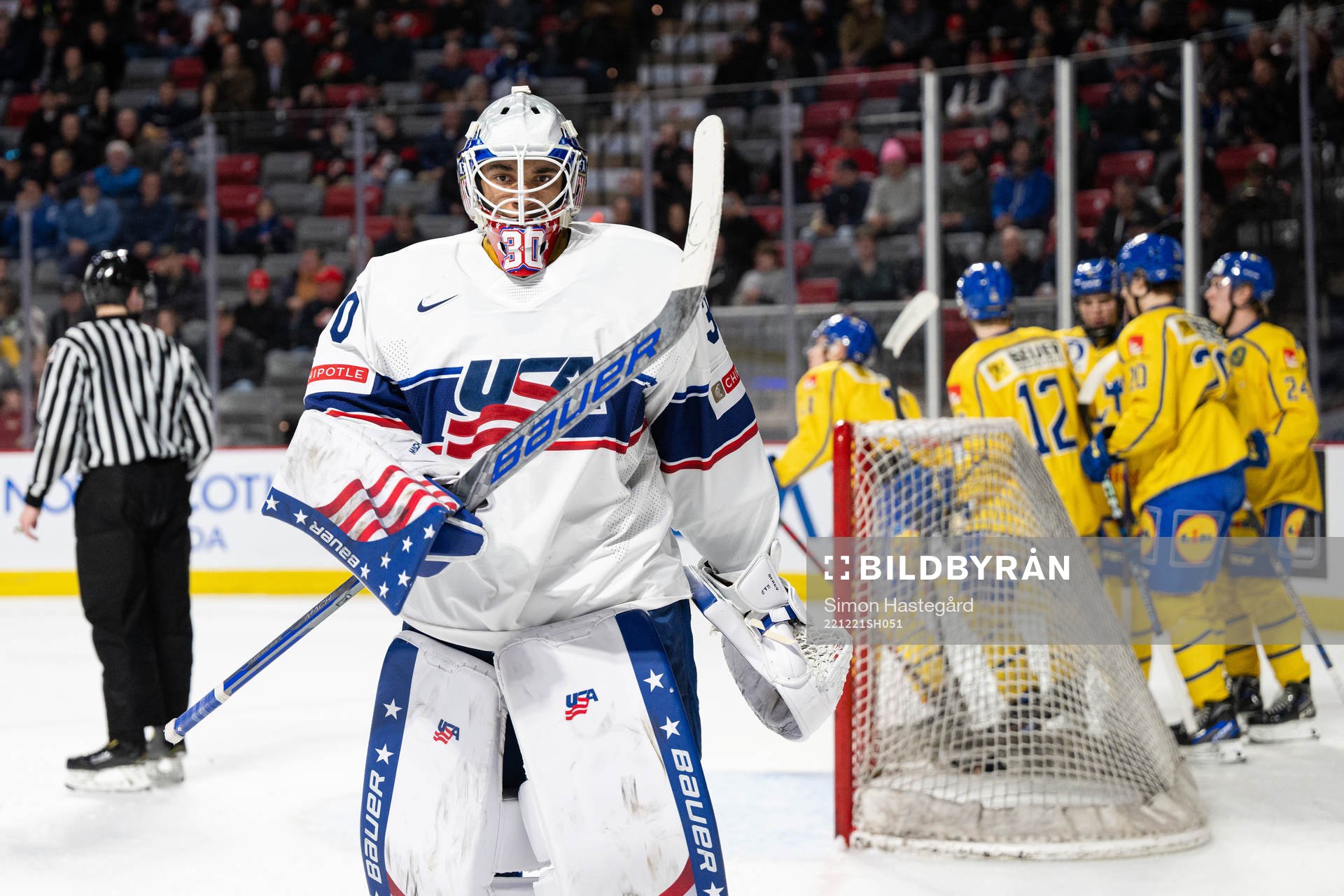 Goaltender Kaidan Mbereko of USA looks dejected