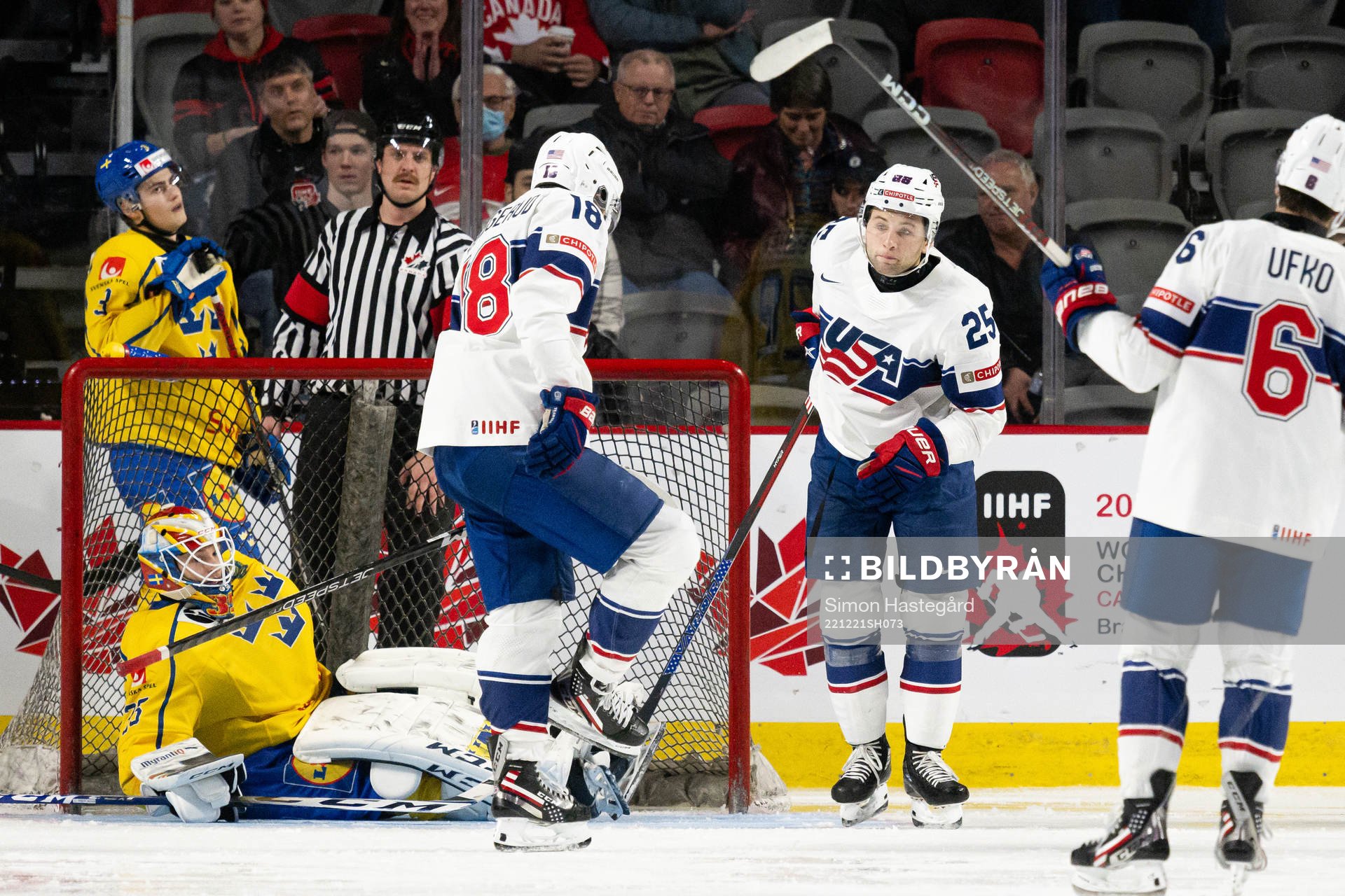 Dylan Duke of USA celebrates the 1-5 goal behind goaltender