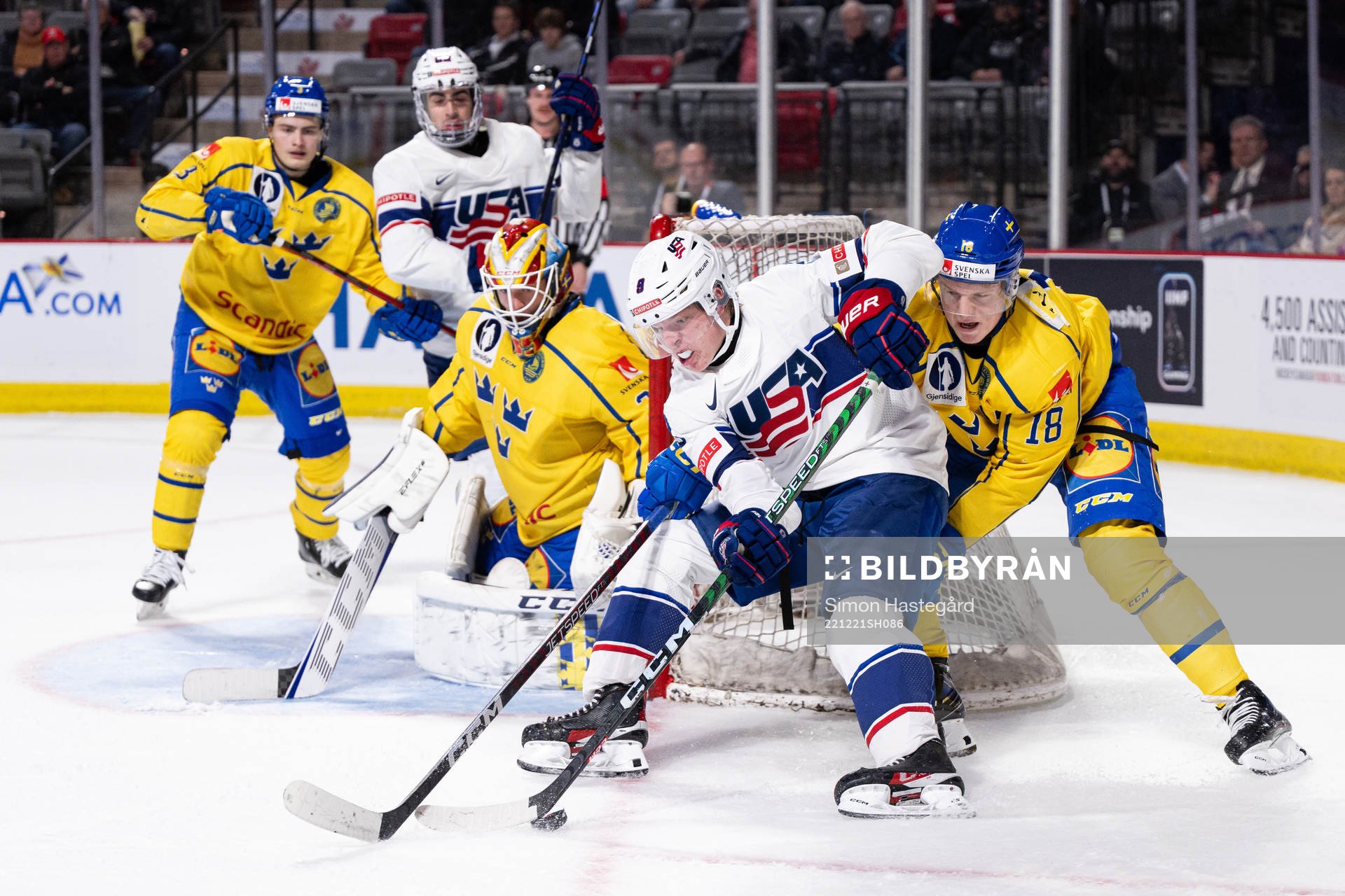Jackson Blake of USA against goaltender Carl Lindbom and