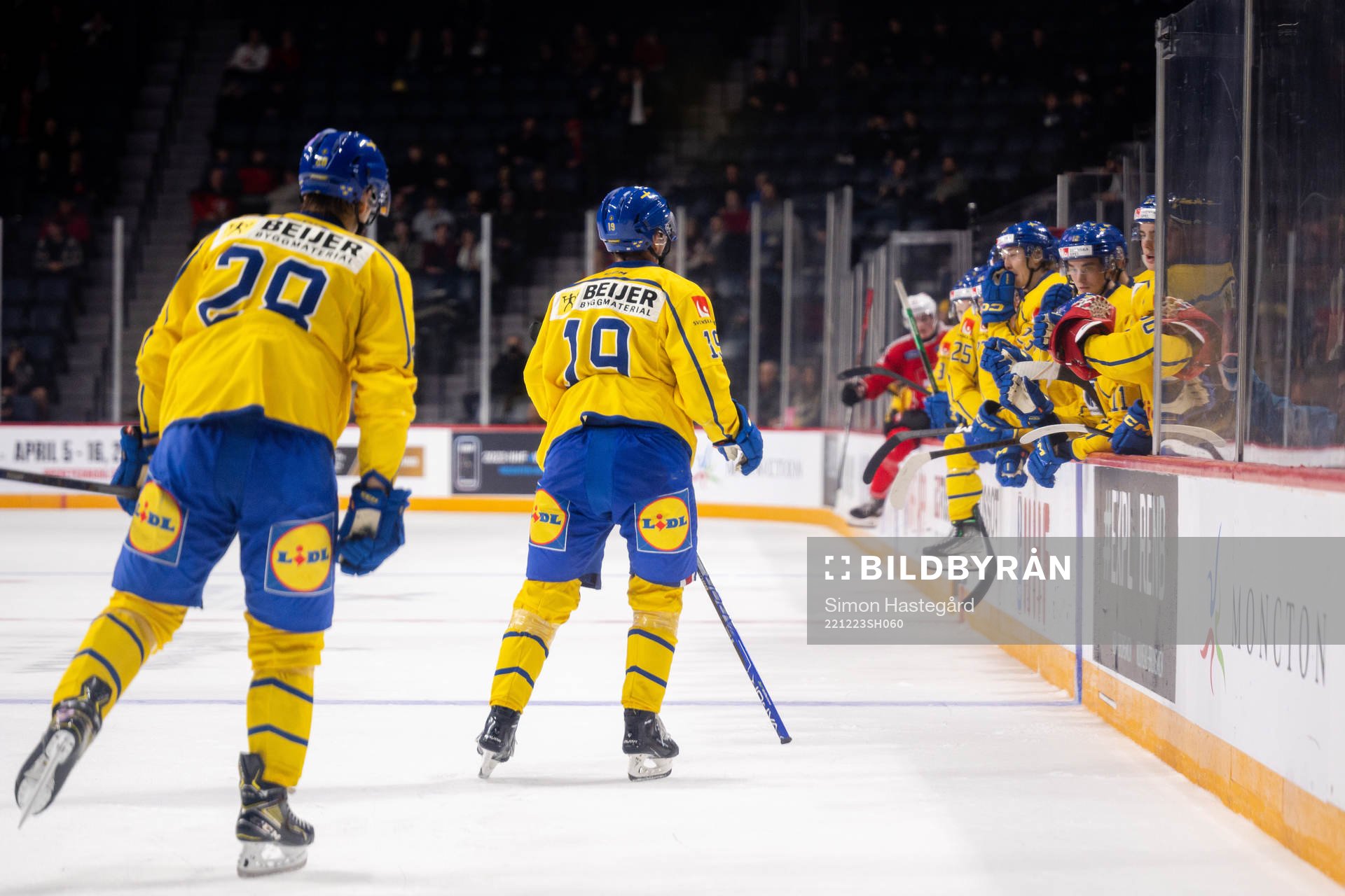 Simon Robertsson and Isak Rosén of Sweden celebrate the
