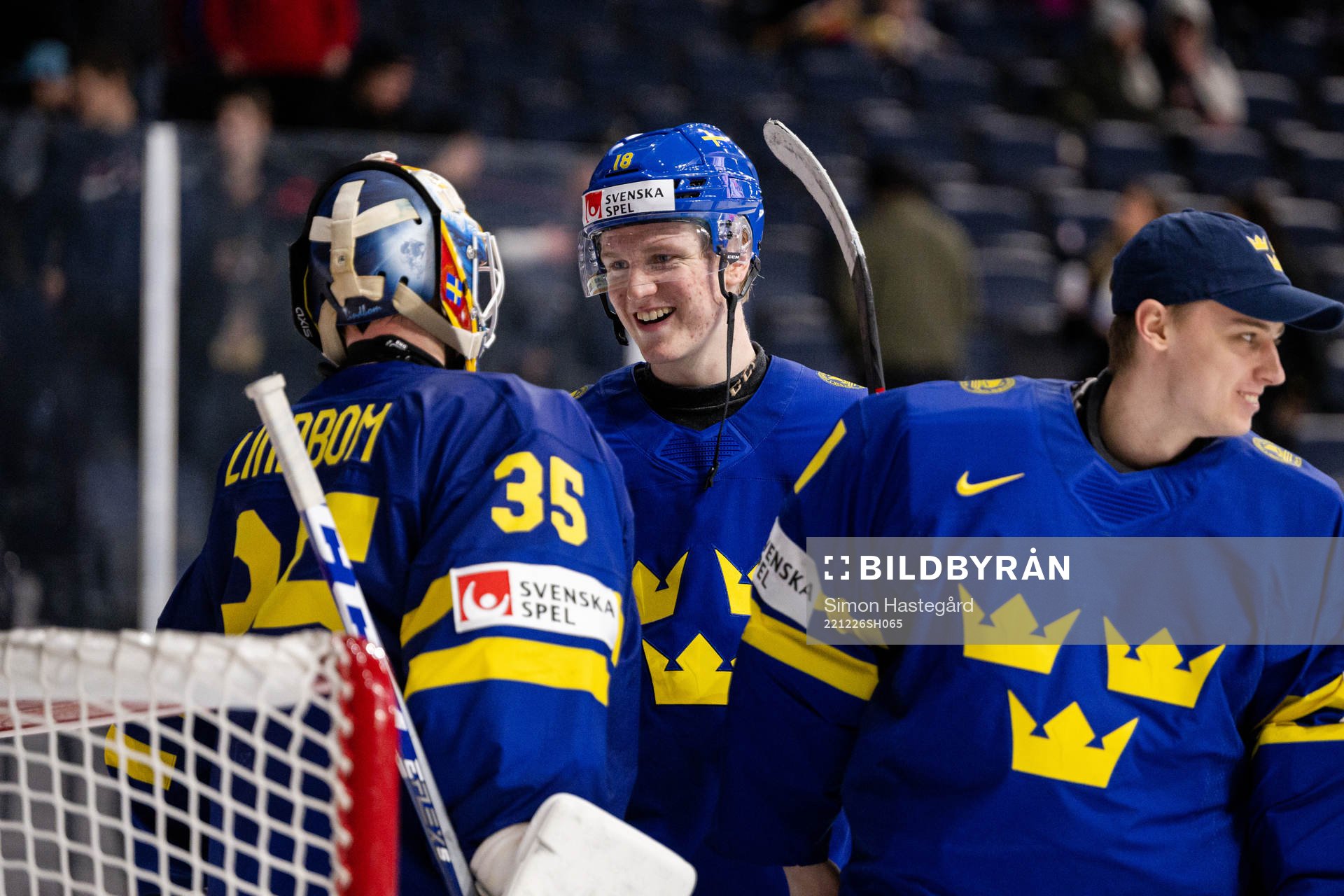 Goaltender Carl Lindbom and Filip Bystedt of Sweden