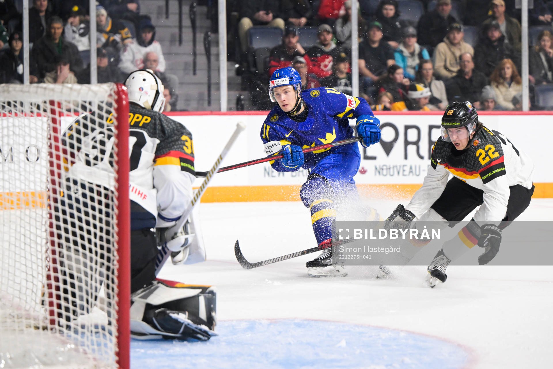 Fabian Lysell of Sweden against goaltender Nikita Quapp and