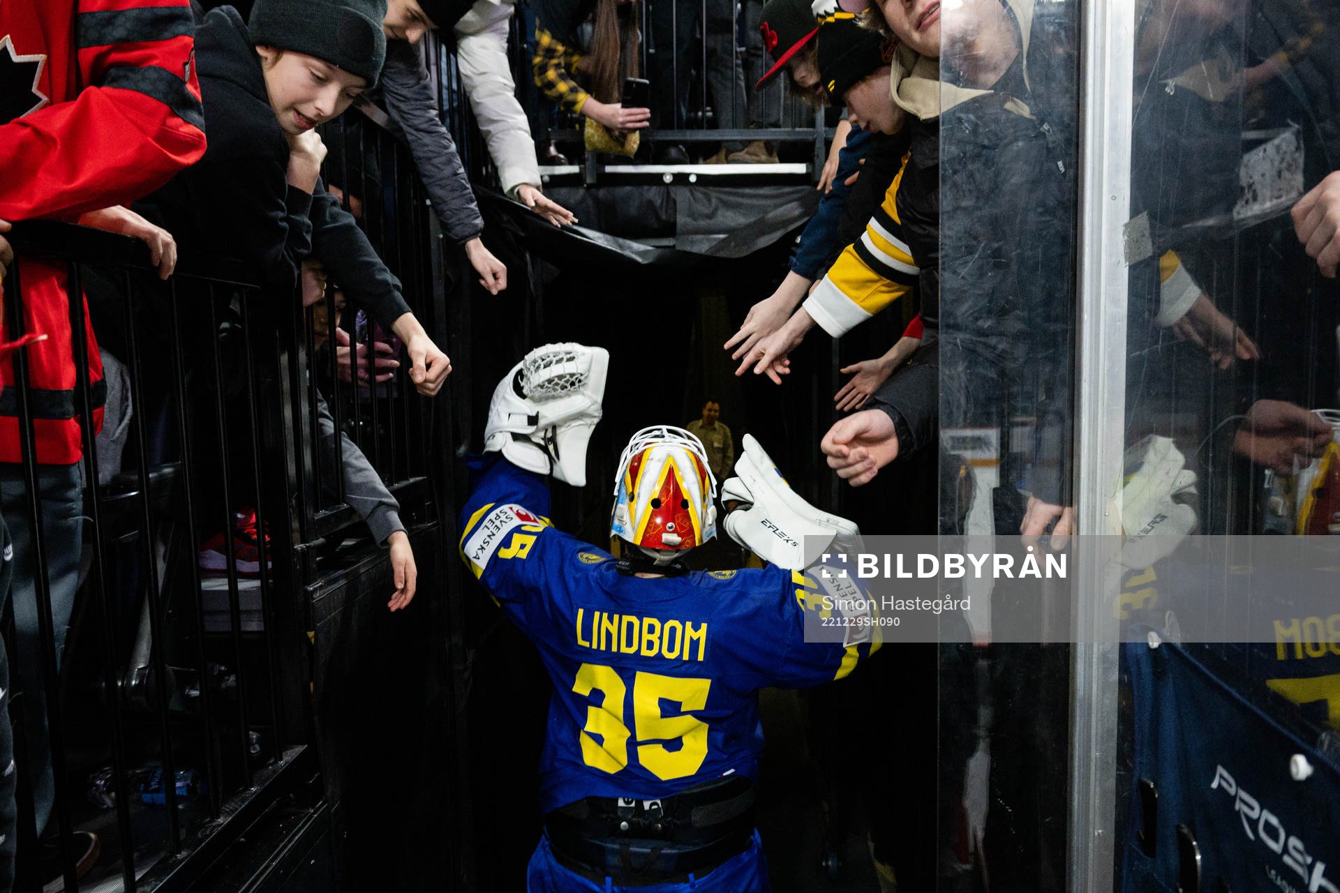 Goaltender Carl Lindbom of Sweden celebrates
