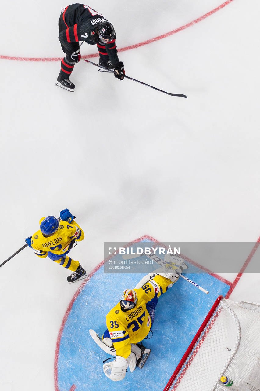 Brennan Othmann of Canada scores the 4-1 goal behind Calle