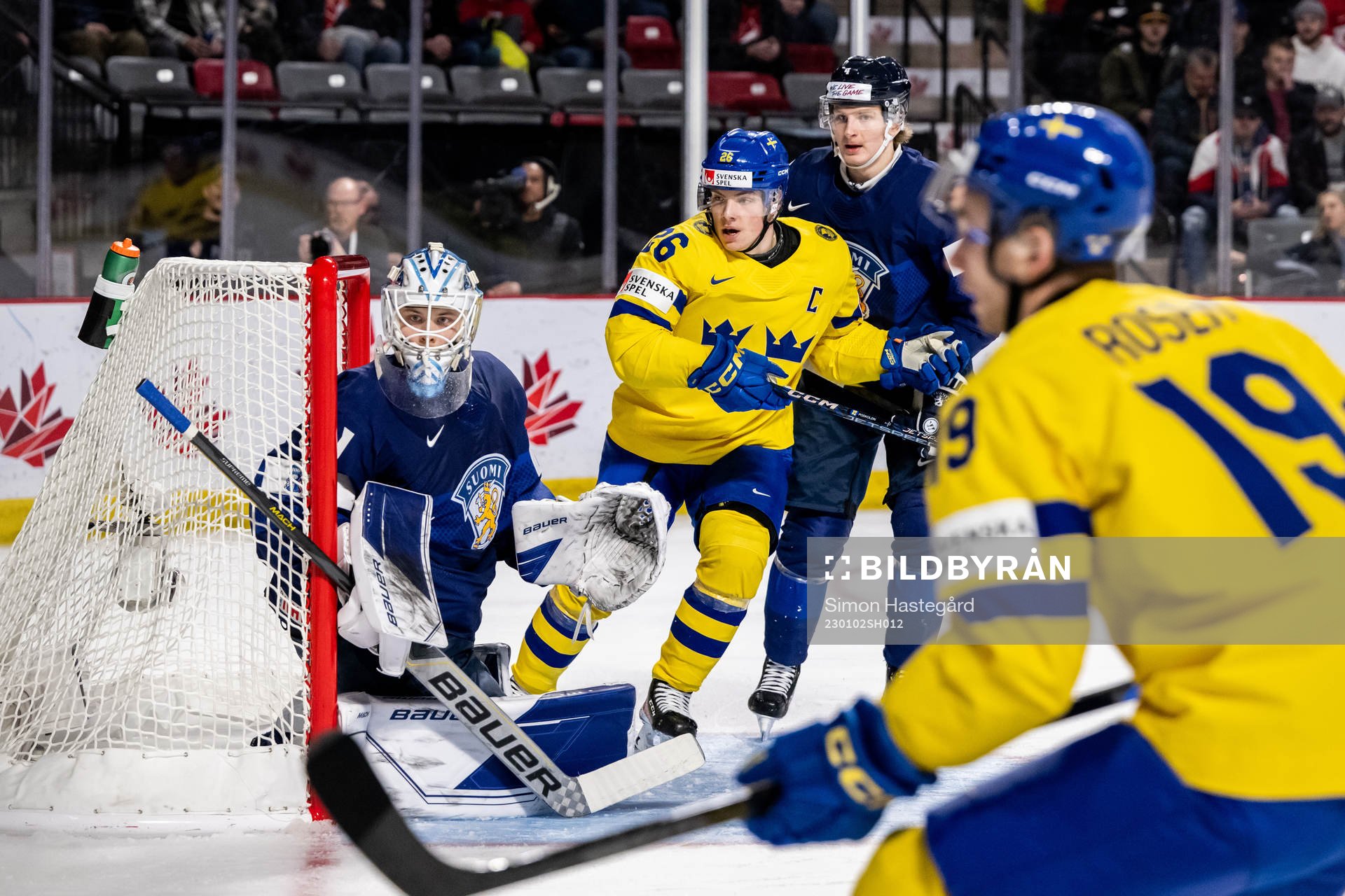 Victor Stjernborg of Sweden against goaltender Jani