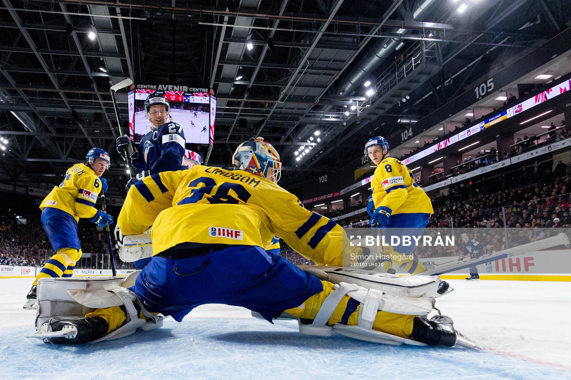 Oliver Kapanen of Finland against goaltender Carl Lindbom