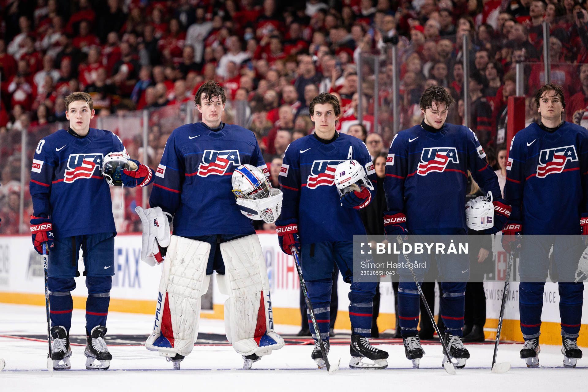 Players of USA look dejected afterthe 2023 IIHF World