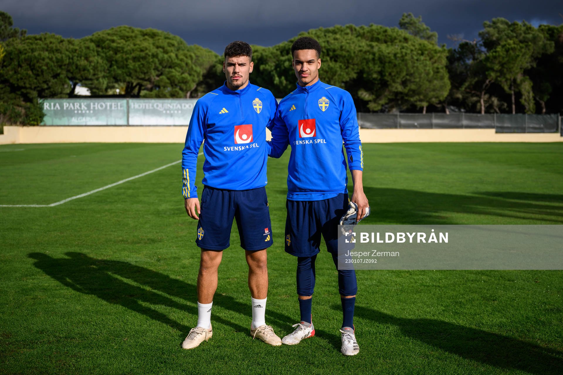 Edvin Kurtulus and goalkeeper Oliver Dovin of the Swedish